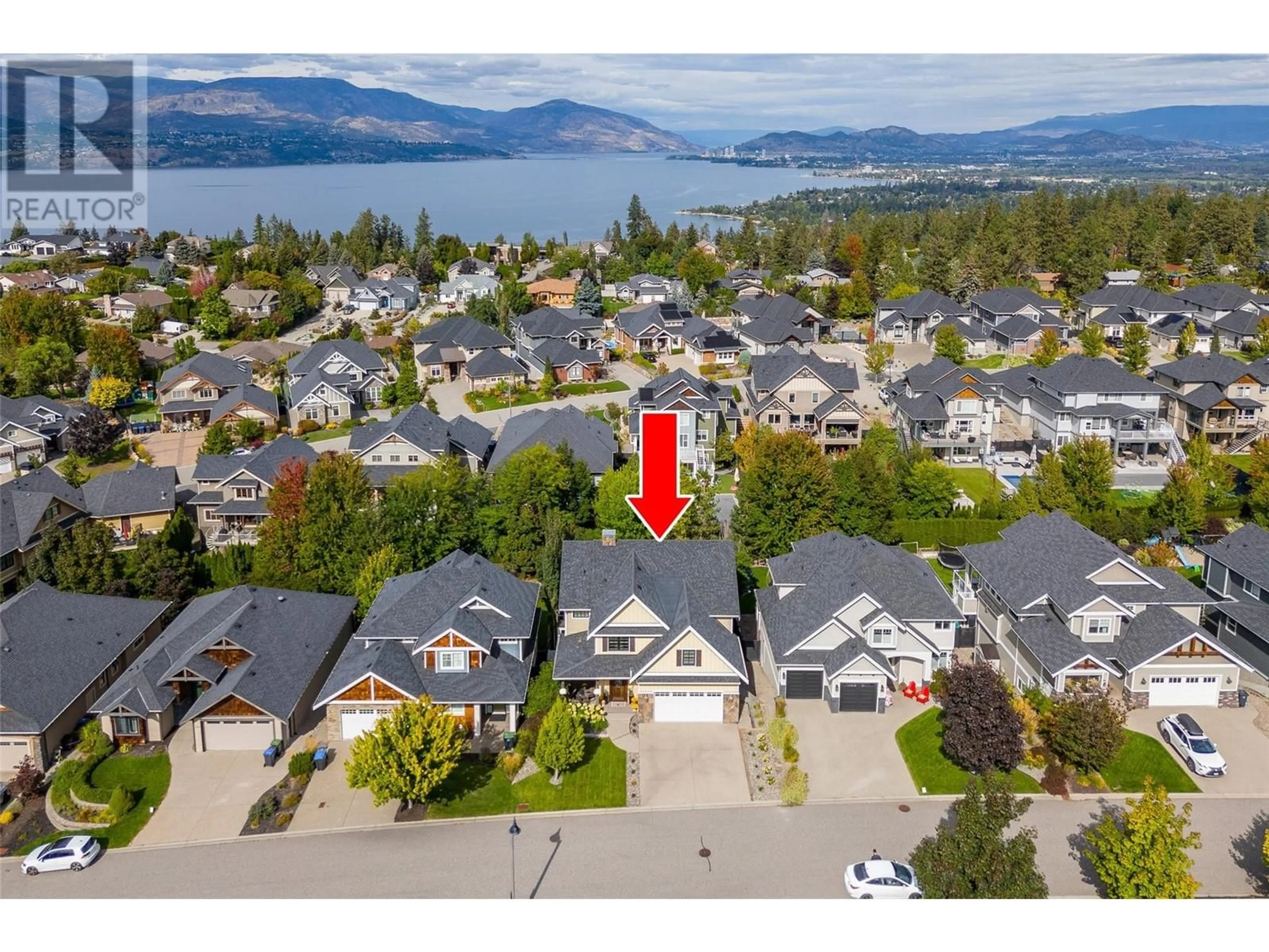 A pic from outside/outdoor area/front of a property/back of a property/a pic from drone, water/lake/river/ocean view for 515 Wren Place Unit# 110, Kelowna British Columbia V1W5H7