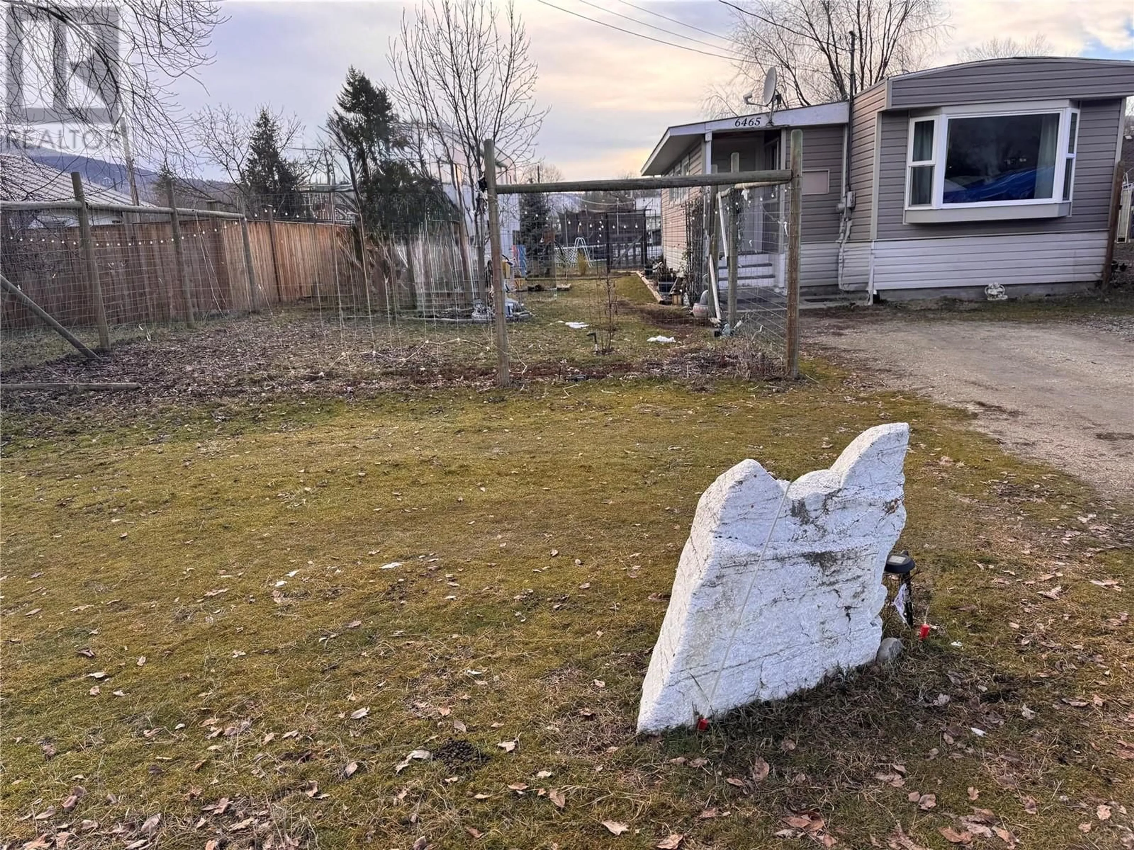 A pic from outside/outdoor area/front of a property/back of a property/a pic from drone, mountain view for 6465 7TH Street, Grand Forks British Columbia V0H1H0