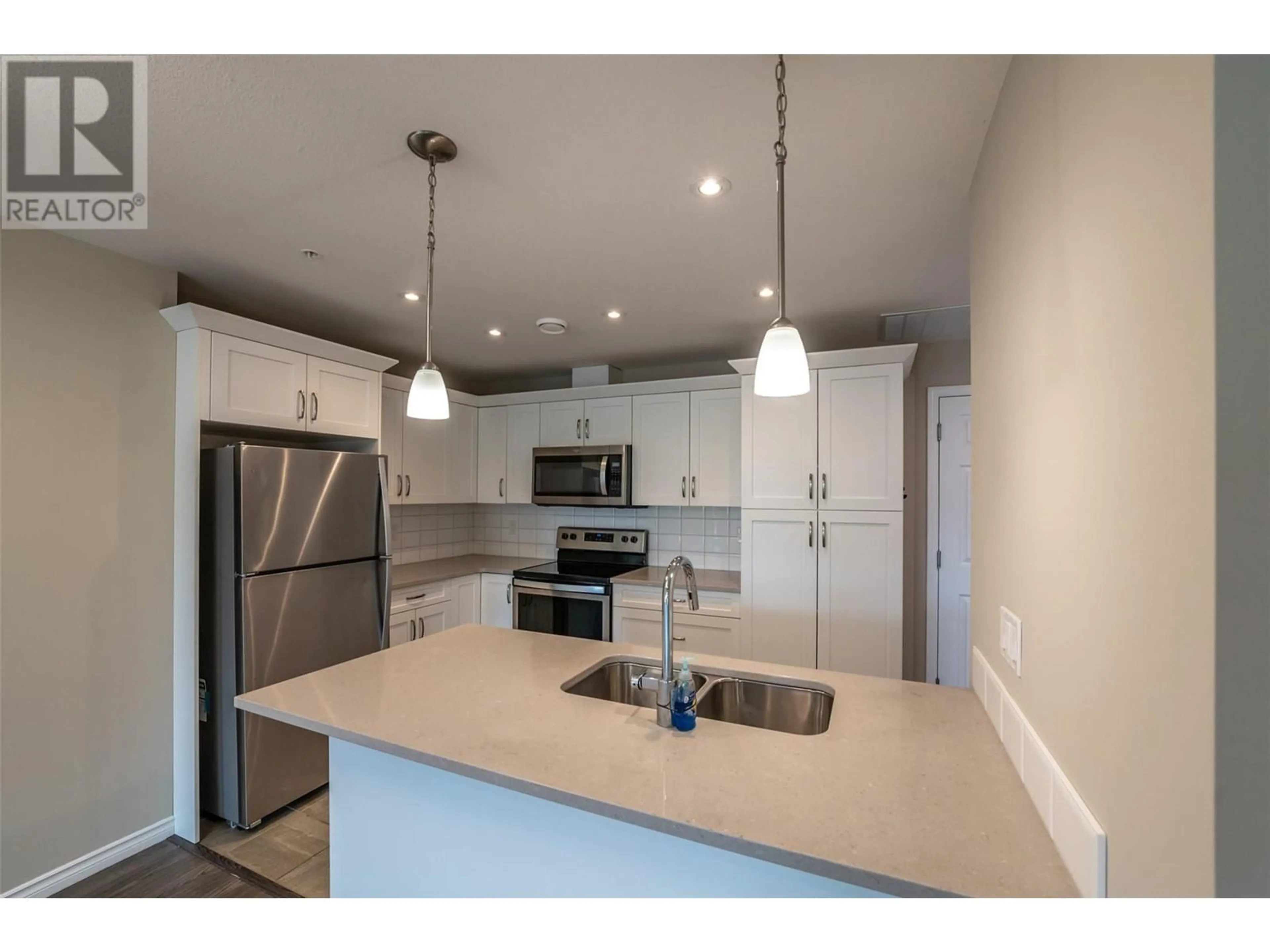 Open concept kitchen, unknown for 3388 Skaha Lake Road Unit# 606, Penticton British Columbia V2A6G4