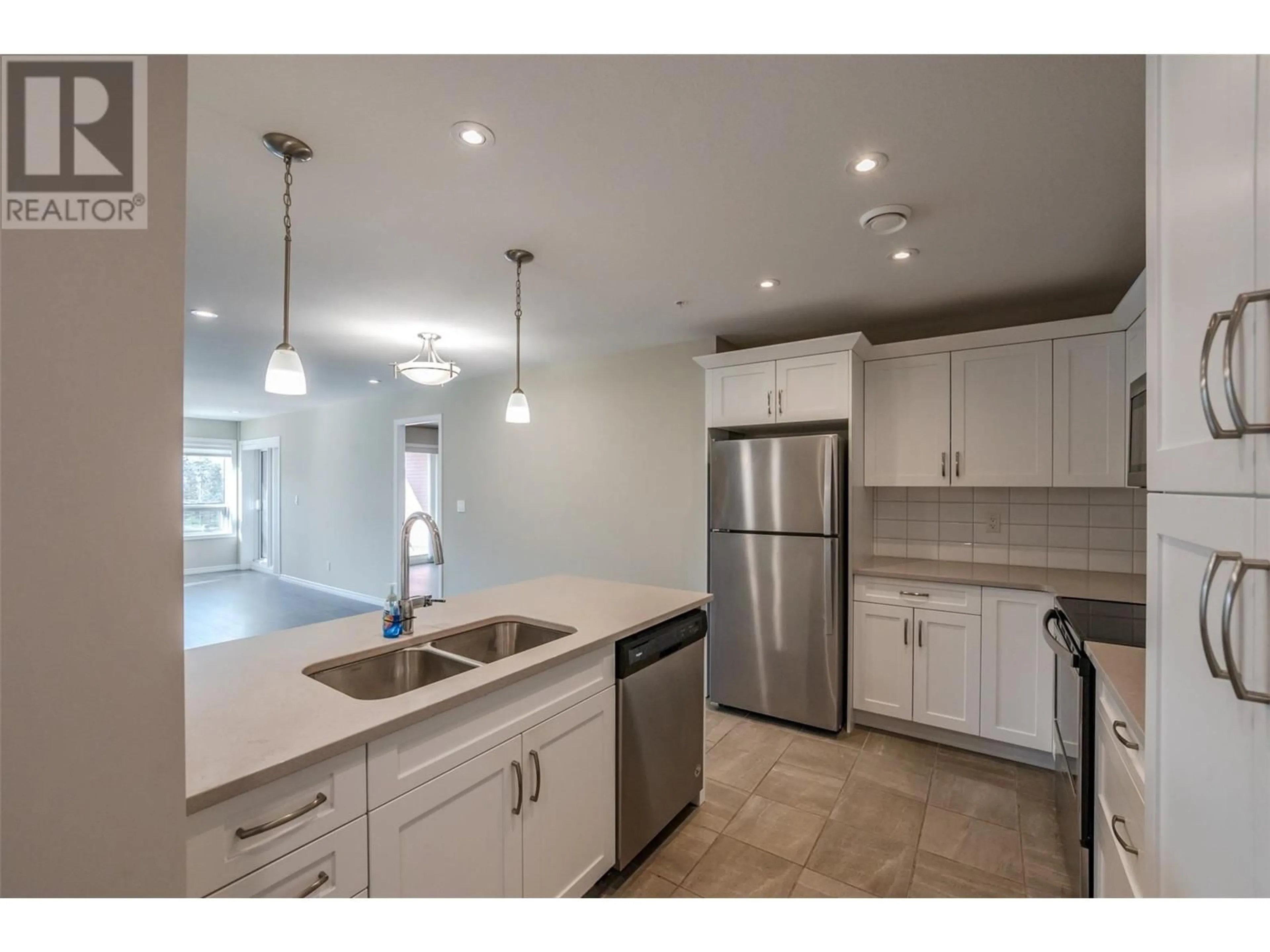 Open concept kitchen, ceramic/tile floor for 3388 Skaha Lake Road Unit# 606, Penticton British Columbia V2A6G4