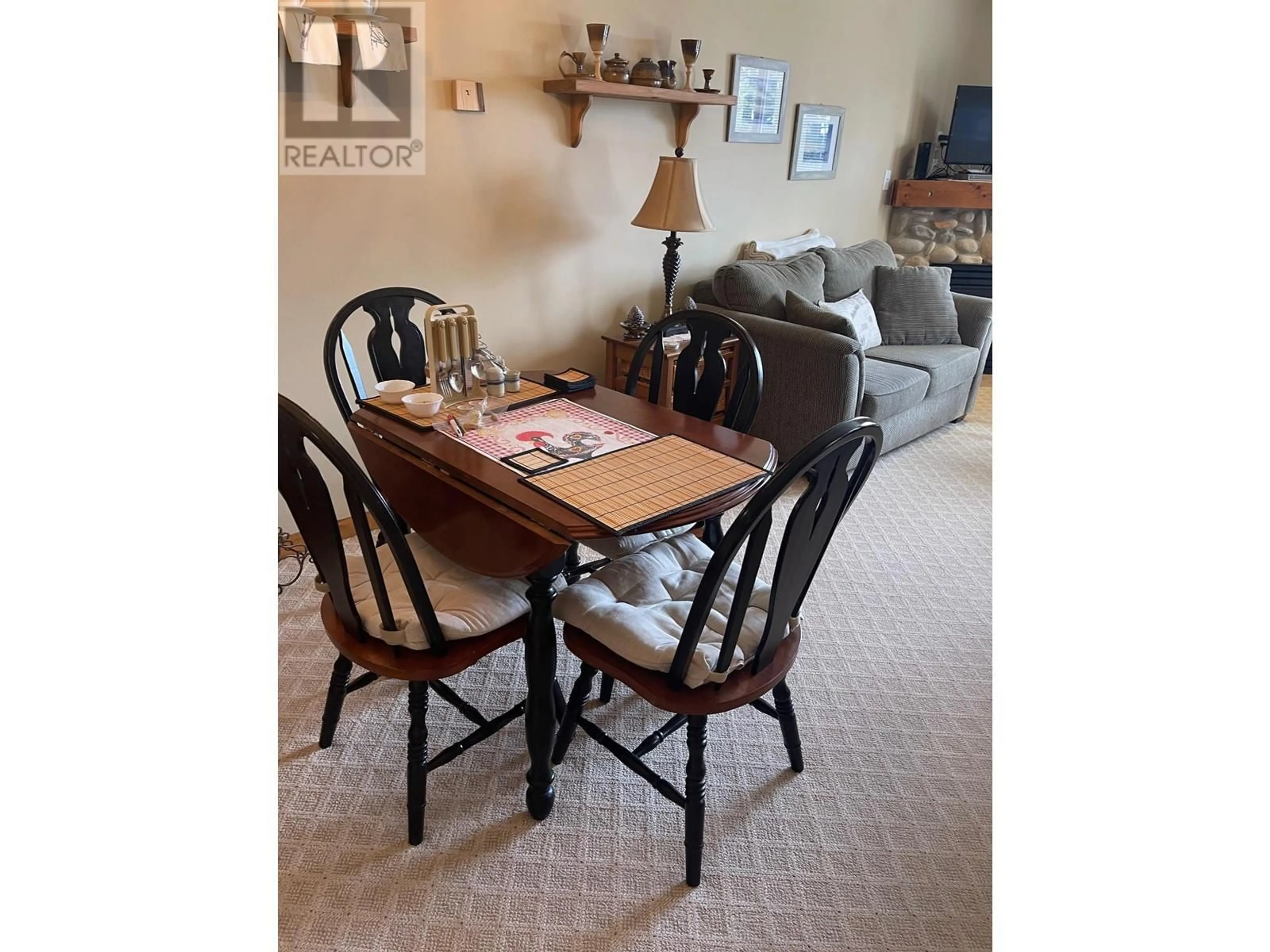 Dining room, wood/laminate floor for 9802 Silver Star Road Unit# 204, Silver Star British Columbia V1B3M1