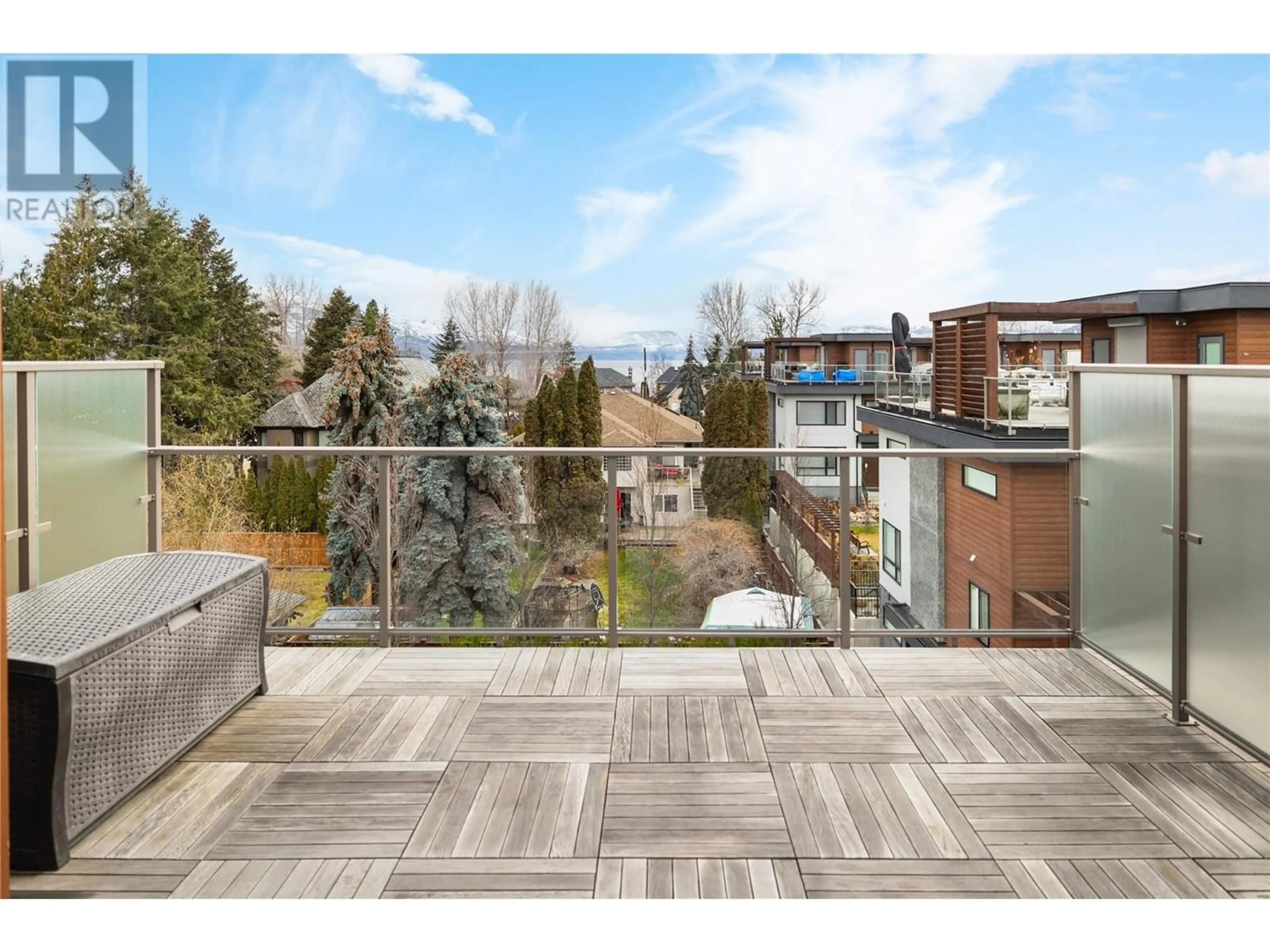 Patio, city buildings view from balcony for 27 - 3510 LANDIE ROAD, Kelowna British Columbia V1W3E9