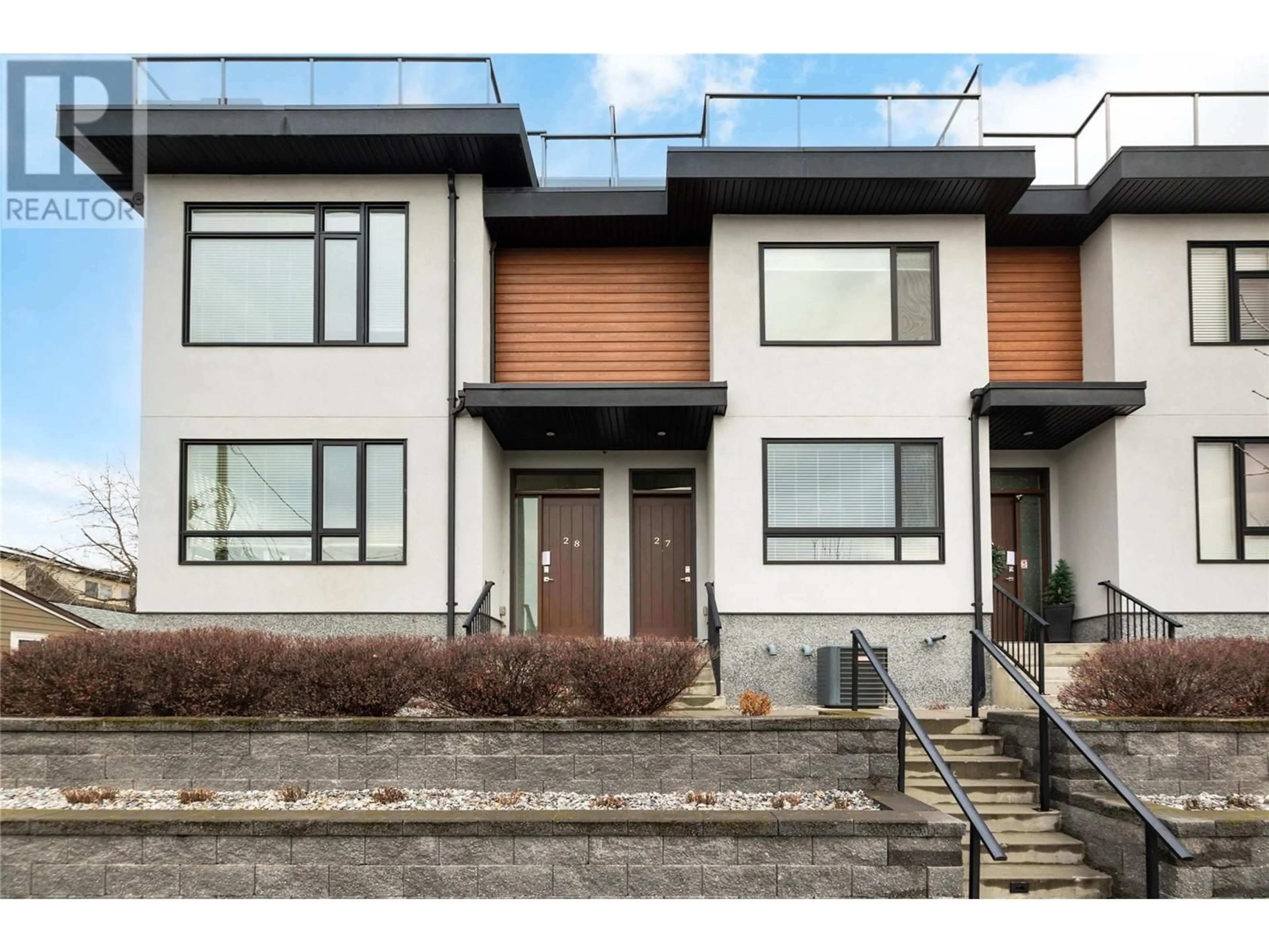 Home with brick exterior material, street for 3510 Landie Road Unit# 27, Kelowna British Columbia V1W3E9