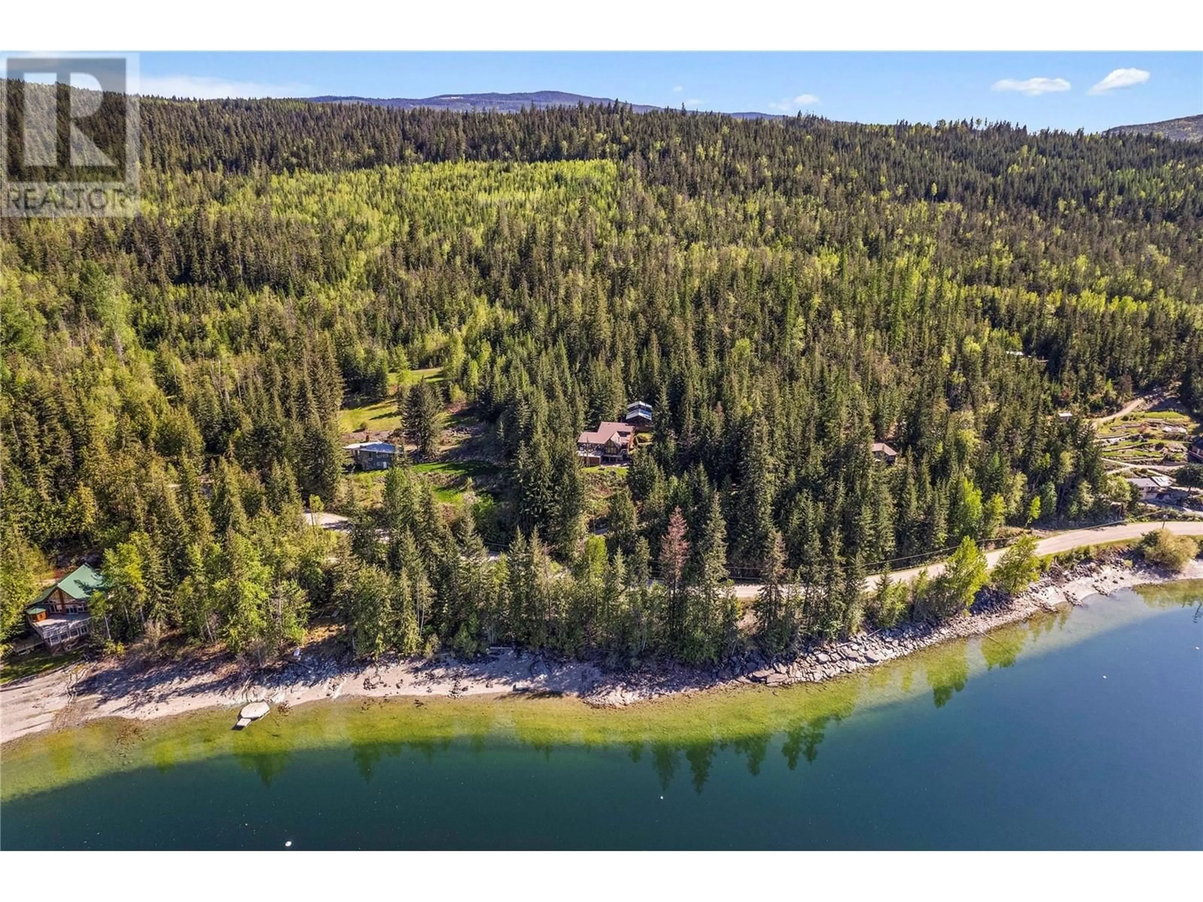 A pic from outside/outdoor area/front of a property/back of a property/a pic from drone, water/lake/river/ocean view for 5508 Eagle Bay Road, Eagle Bay British Columbia V0E1T0