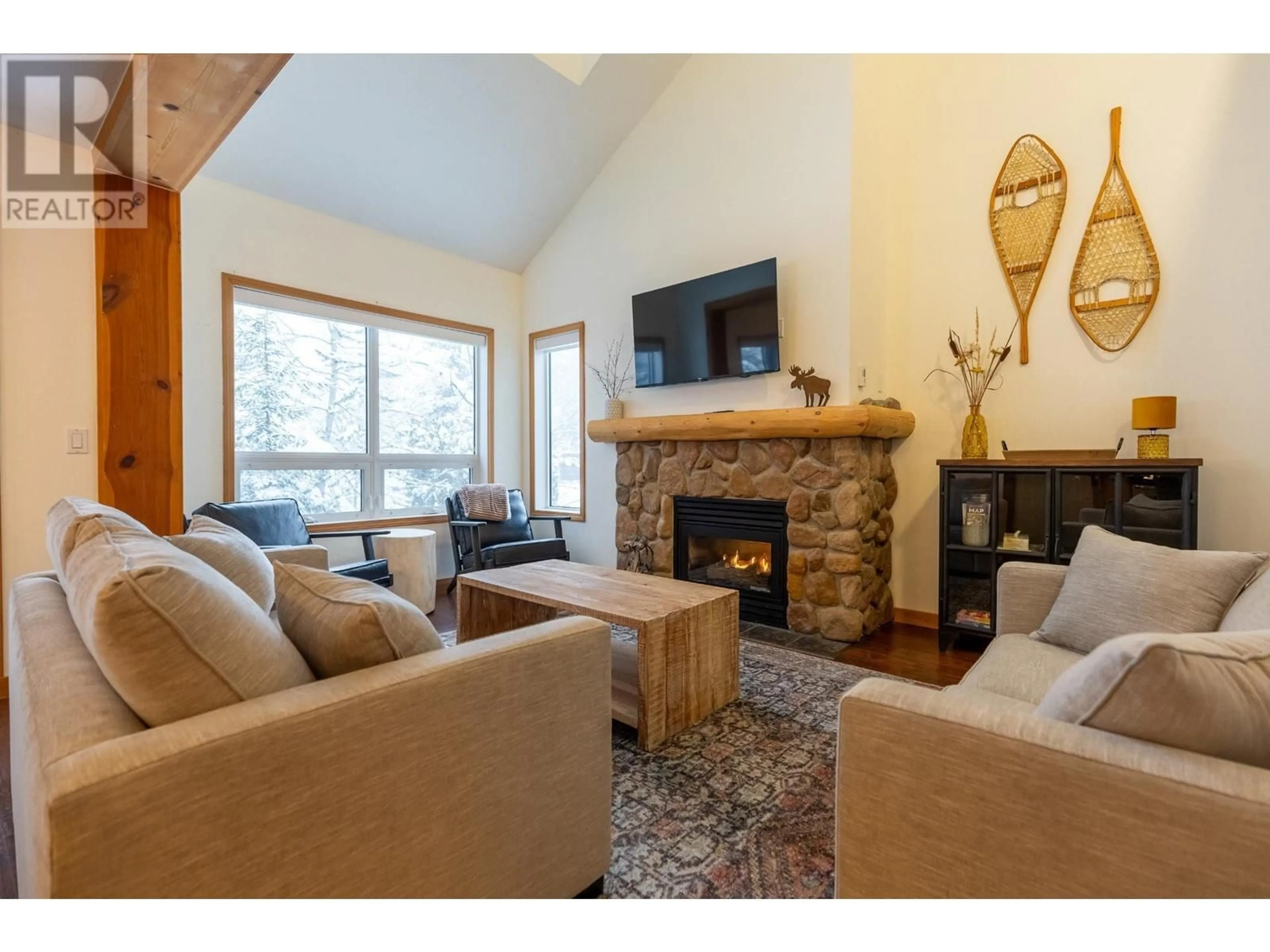 Living room with furniture, wood/laminate floor for 36 - 5423 BOOMERANG WAY, Fernie British Columbia V0B1M6