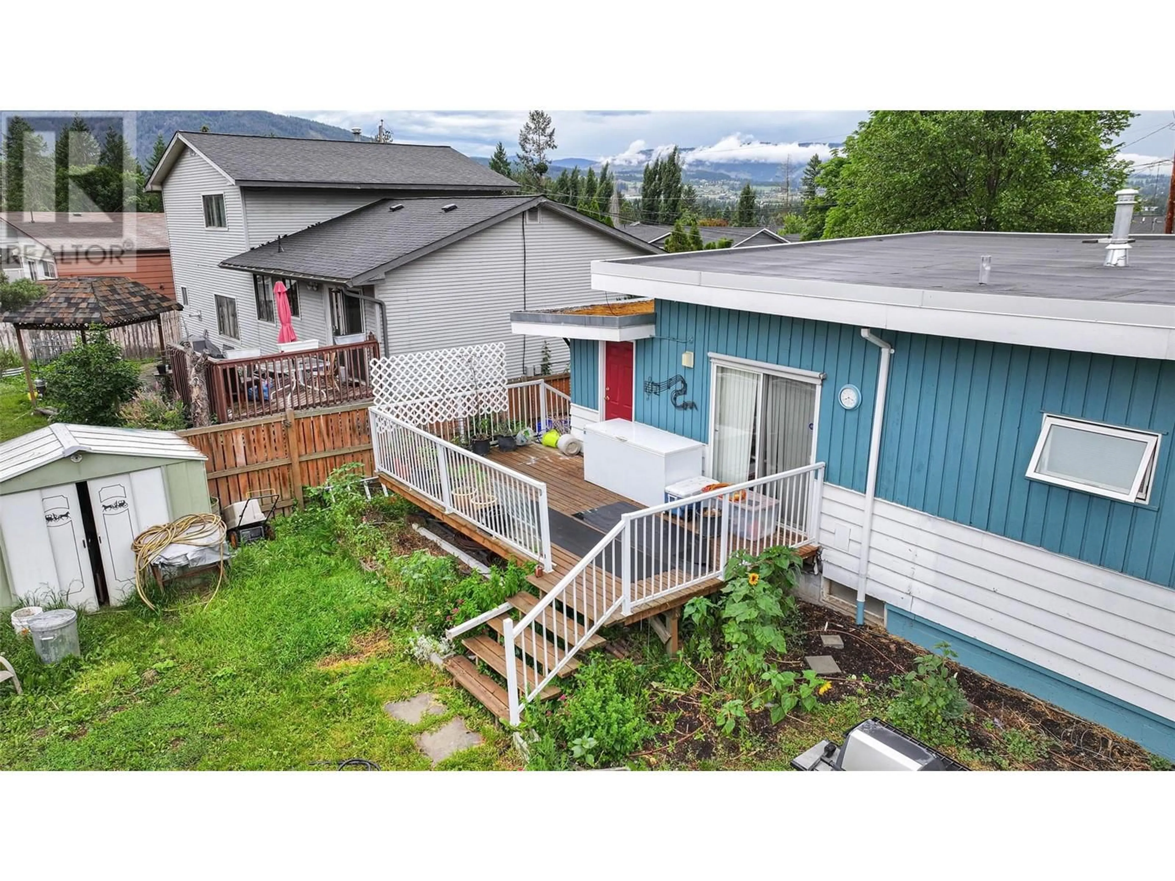 A pic from outside/outdoor area/front of a property/back of a property/a pic from drone, mountain view for 2505 Henderson Drive, Armstrong British Columbia V0E1B1