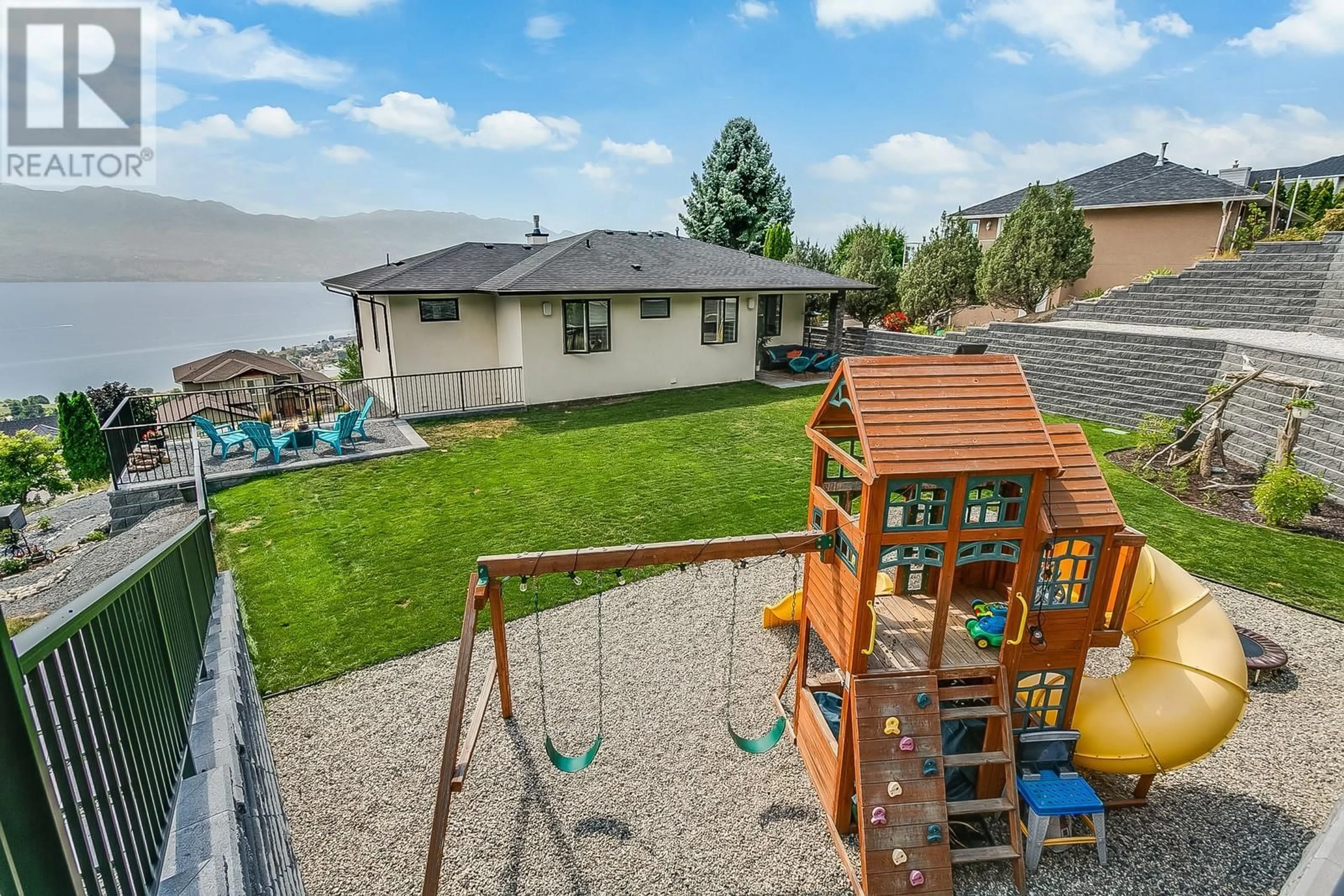 A pic from outside/outdoor area/front of a property/back of a property/a pic from drone, mountain view for 1296 Menu Road, West Kelowna British Columbia V1Z3K2