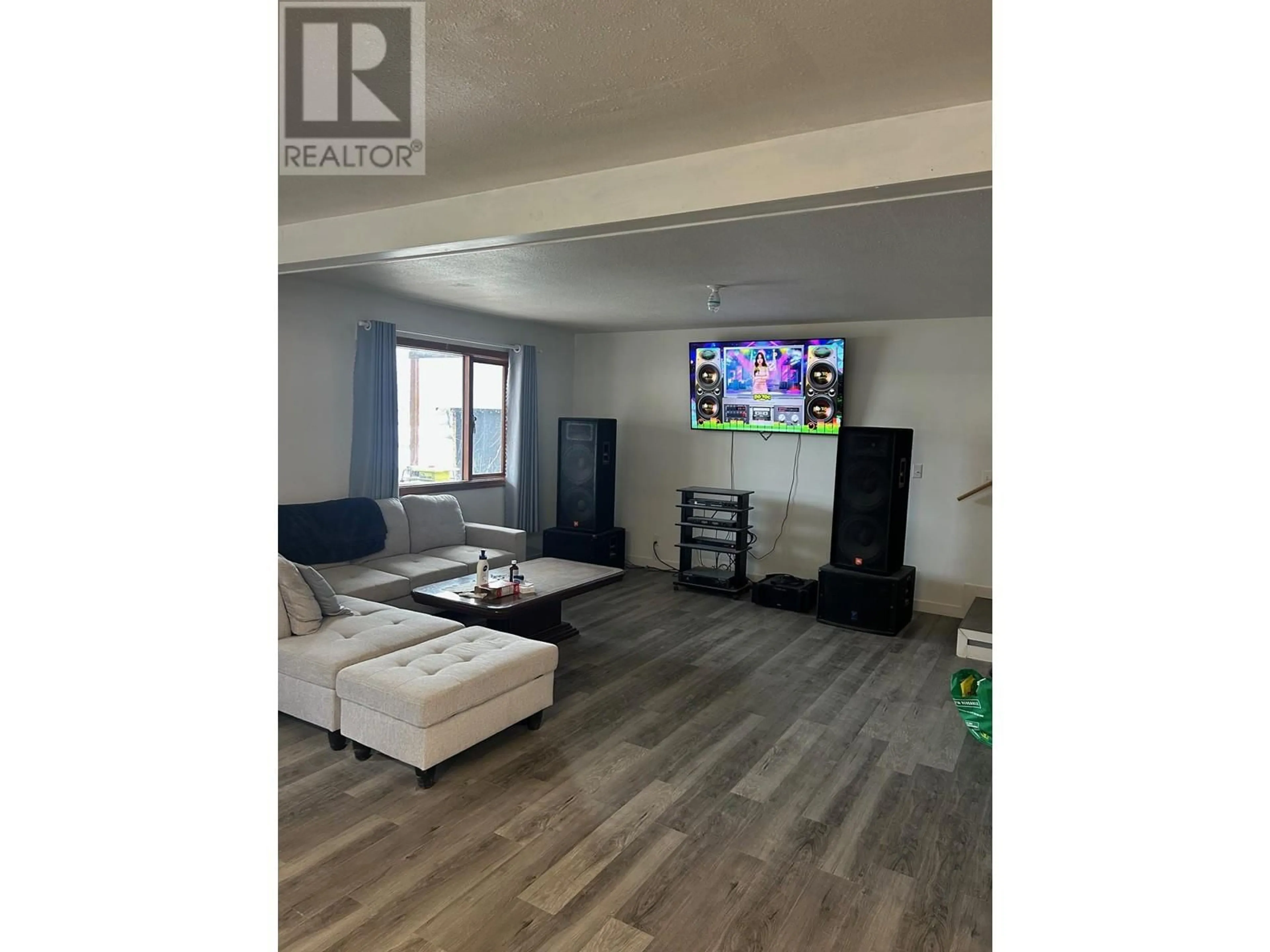 Living room with furniture, wood/laminate floor for 3854 TRINITY VALLEY ROAD, Enderby British Columbia V0E1V5