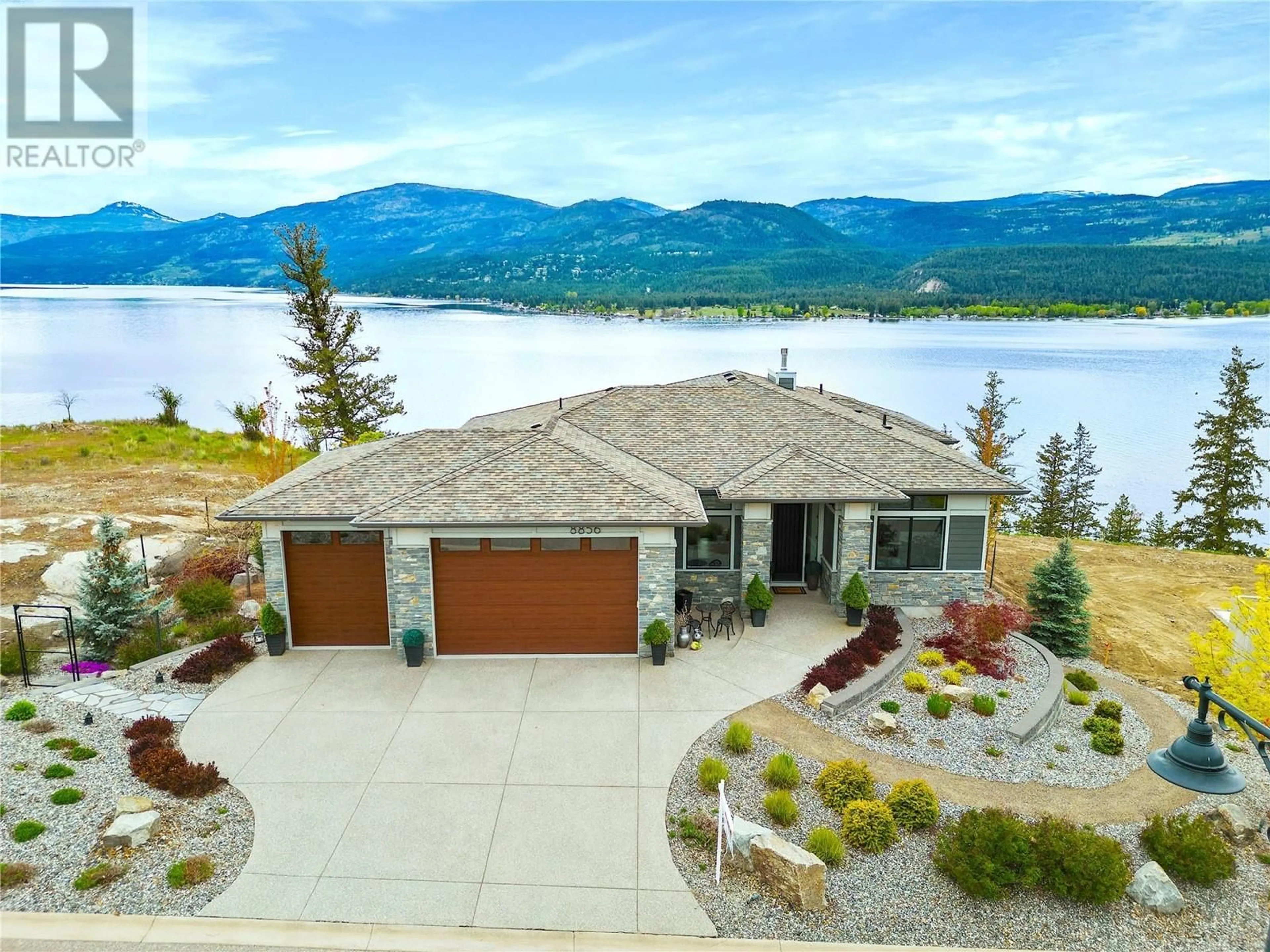 A pic from outside/outdoor area/front of a property/back of a property/a pic from drone, water/lake/river/ocean view for 8856 Somerset Place, Vernon British Columbia V1H2L5