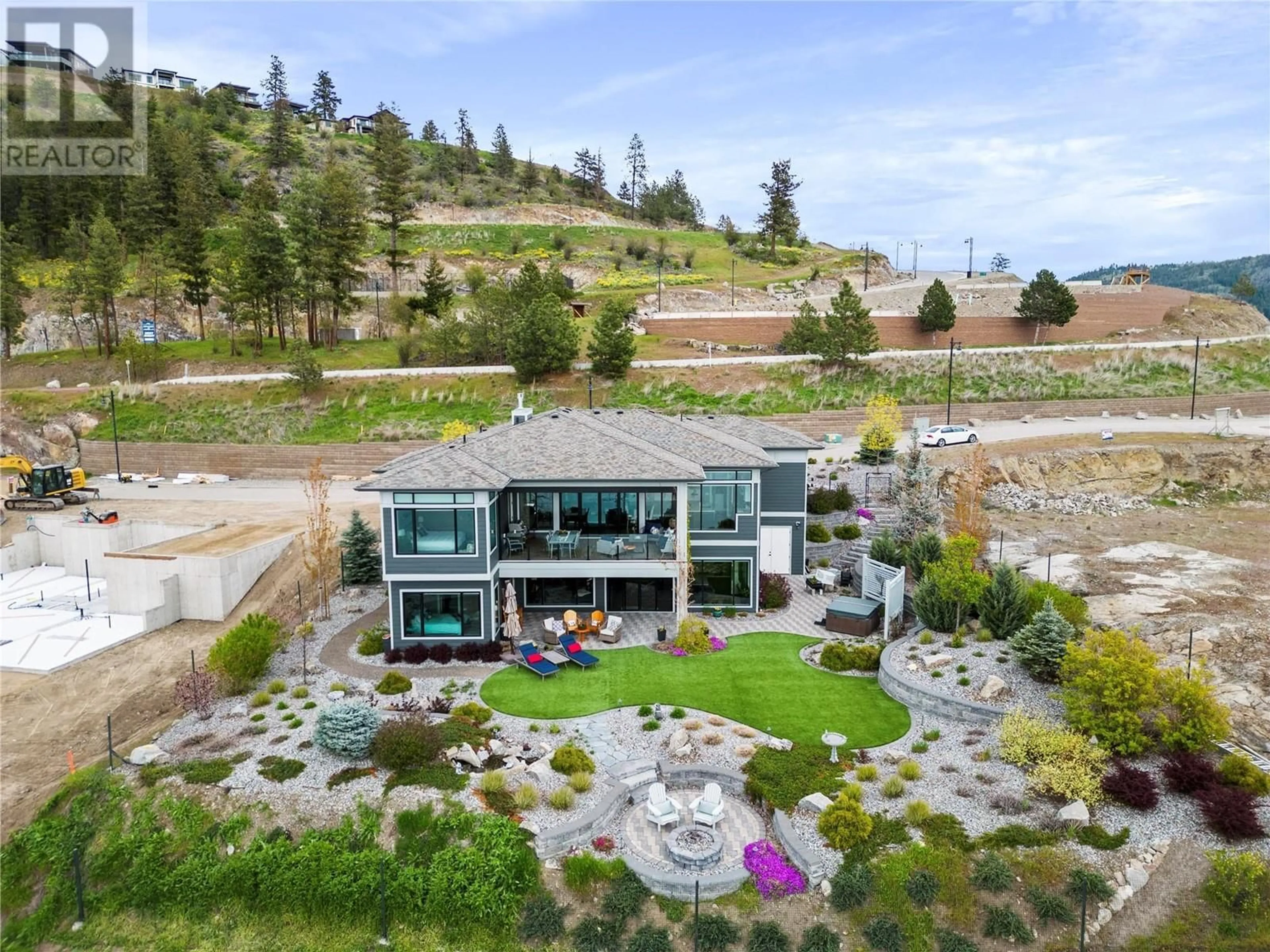 A pic from outside/outdoor area/front of a property/back of a property/a pic from drone, mountain view for 8856 Somerset Place, Vernon British Columbia V1H2L5