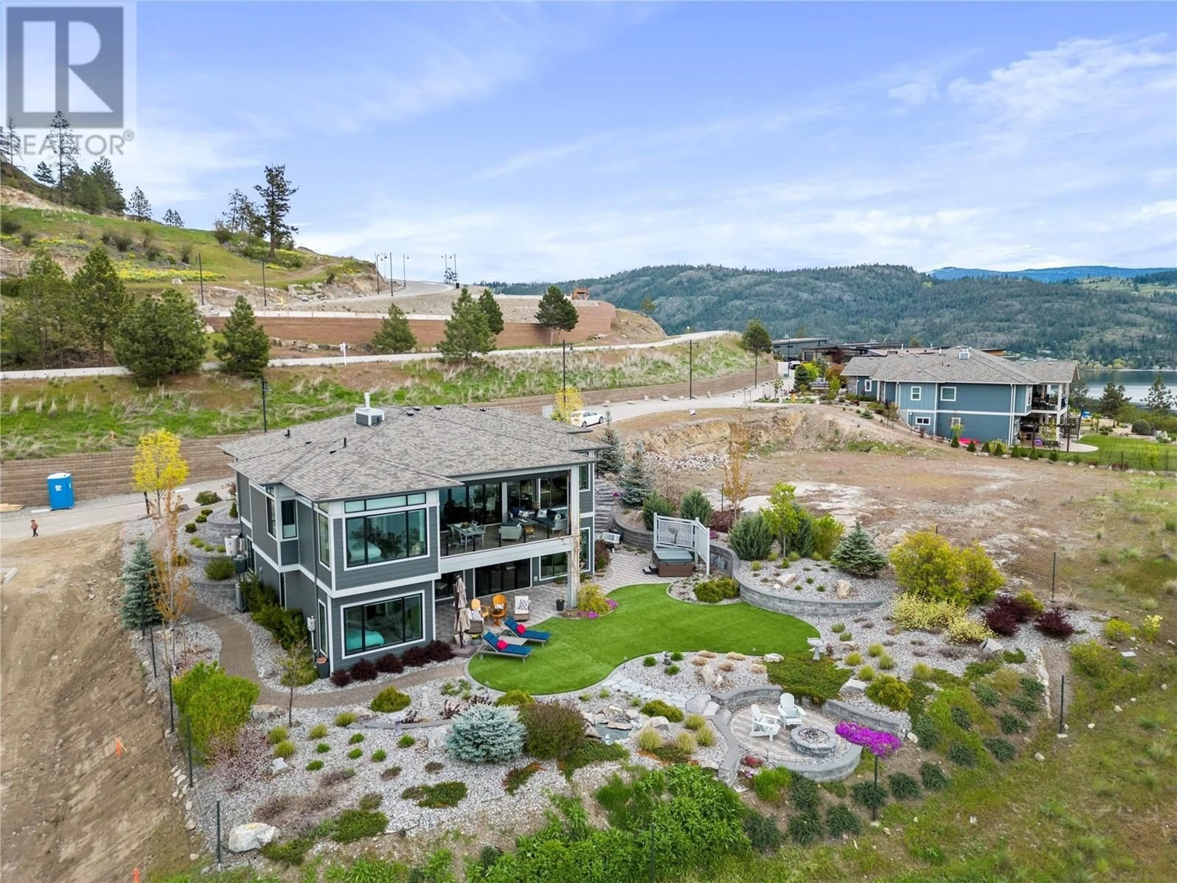 A pic from outside/outdoor area/front of a property/back of a property/a pic from drone, water/lake/river/ocean view for 8856 Somerset Place, Vernon British Columbia V1H2L5