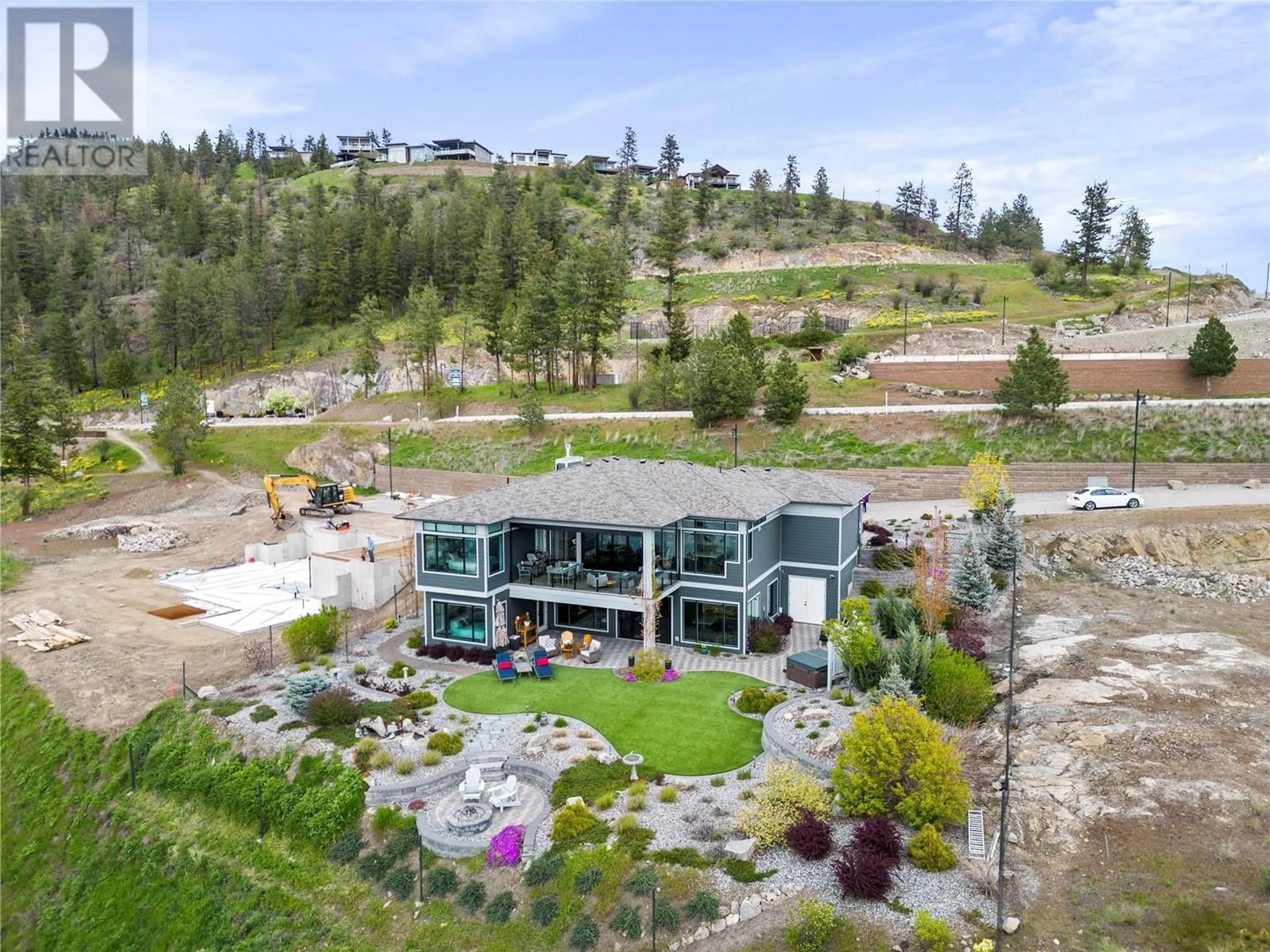 A pic from outside/outdoor area/front of a property/back of a property/a pic from drone, mountain view for 8856 Somerset Place, Vernon British Columbia V1H2L5