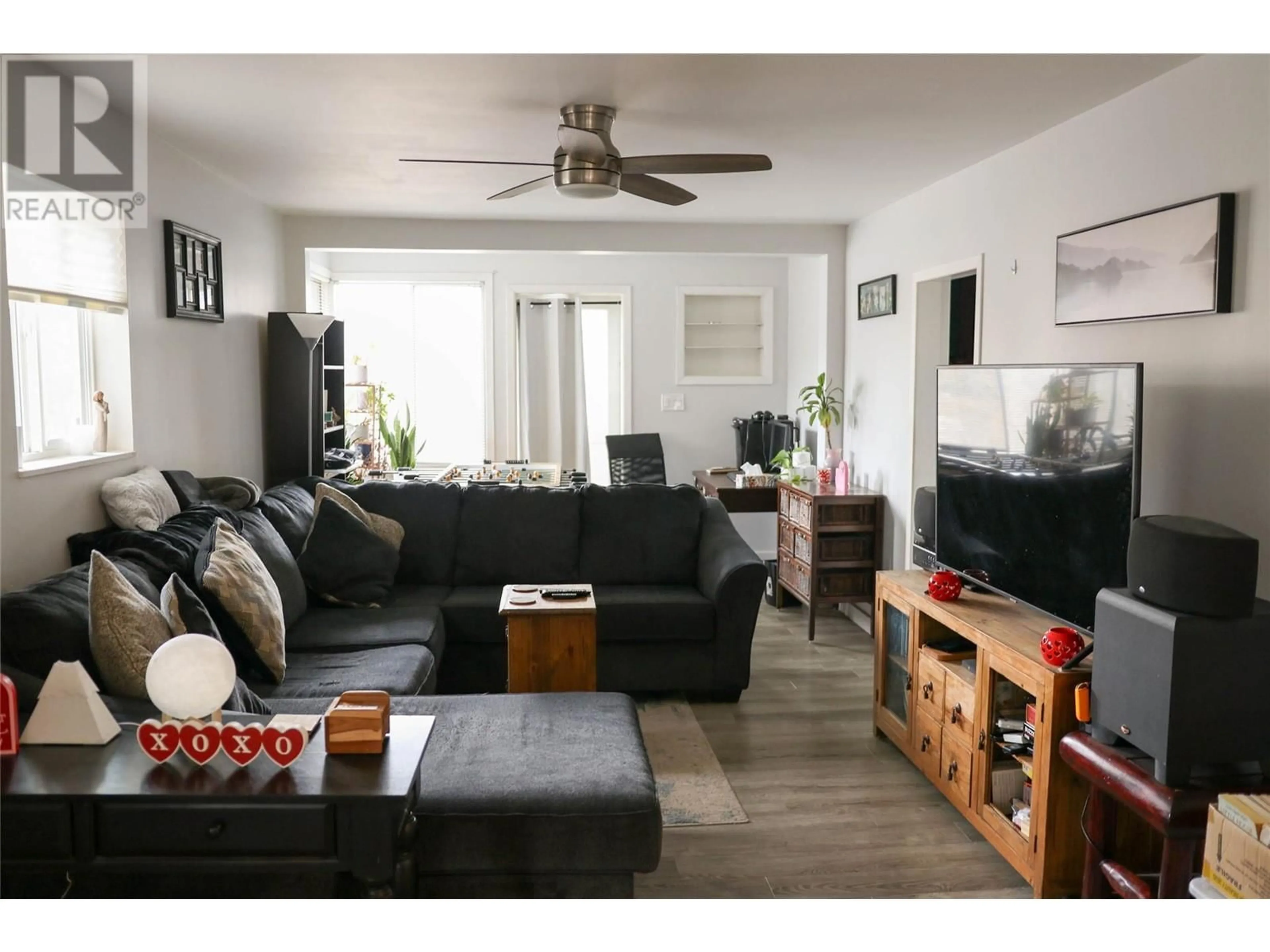 Living room with furniture, wood/laminate floor for 2308 COLUMBIA Avenue, Castlegar British Columbia V1N2X1