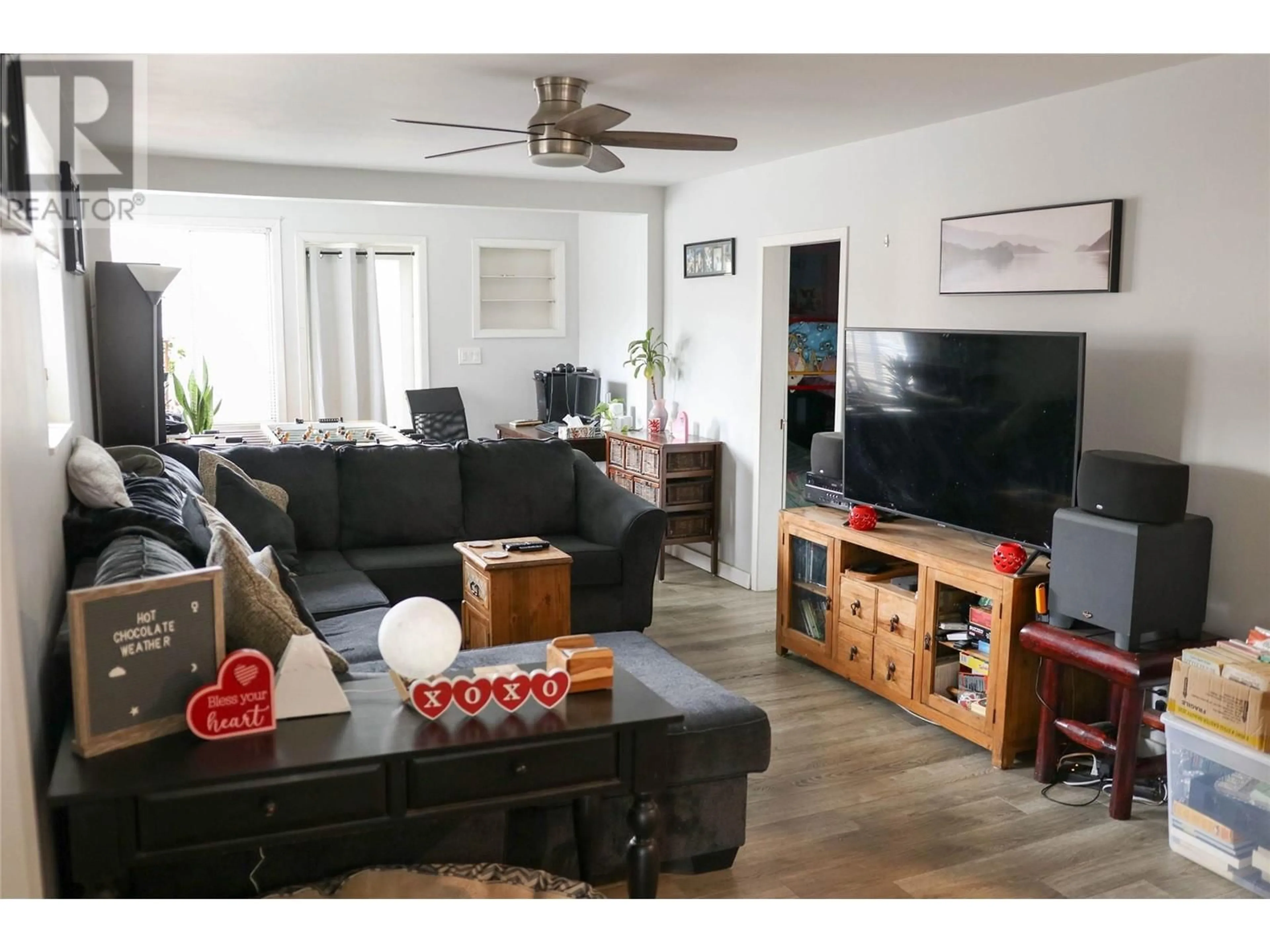 Living room with furniture, wood/laminate floor for 2308 COLUMBIA Avenue, Castlegar British Columbia V1N2X1