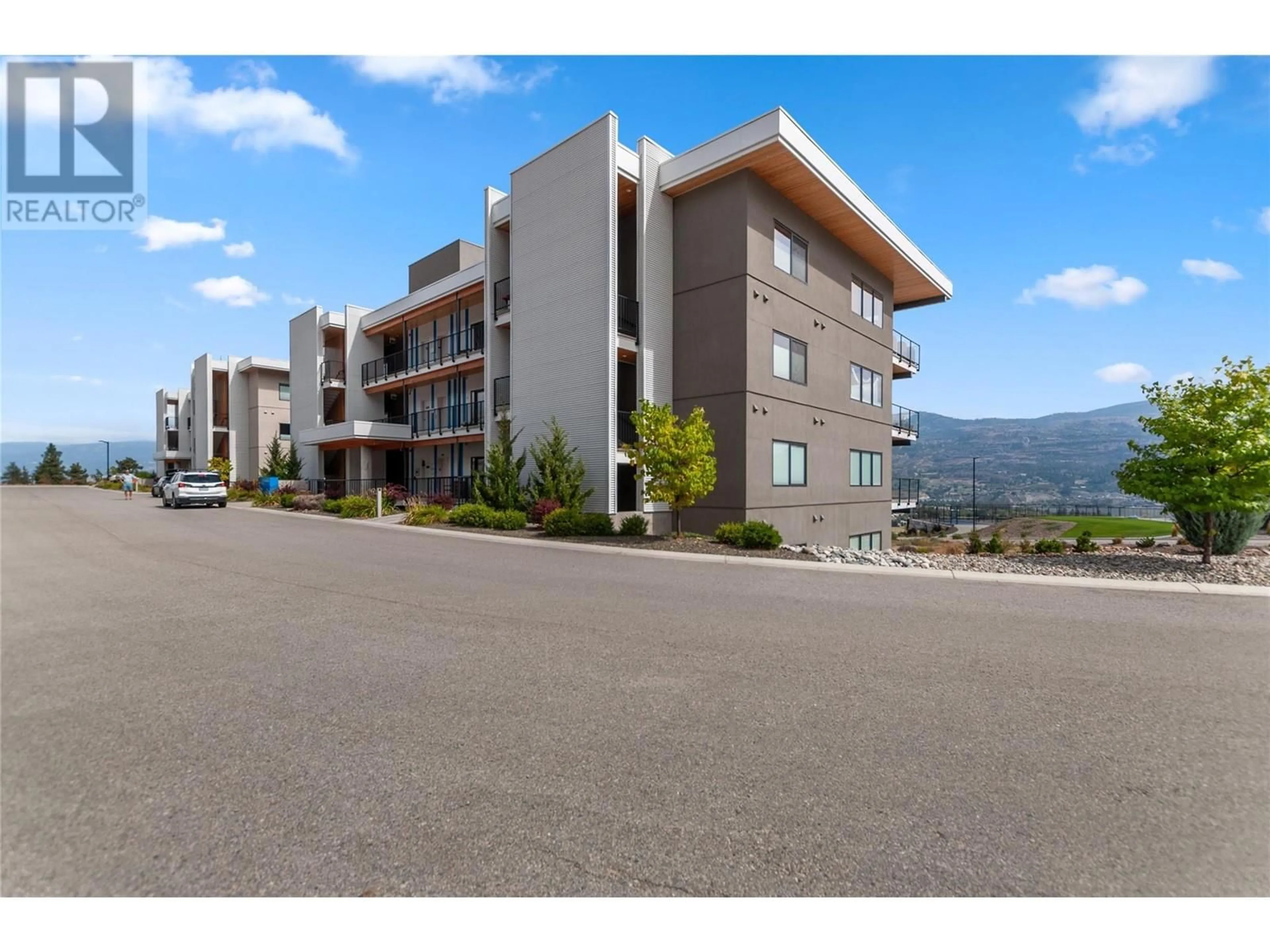 A pic from outside/outdoor area/front of a property/back of a property/a pic from drone, mountain view for 100 Vista Way Unit# 112, Penticton British Columbia V2A0B3