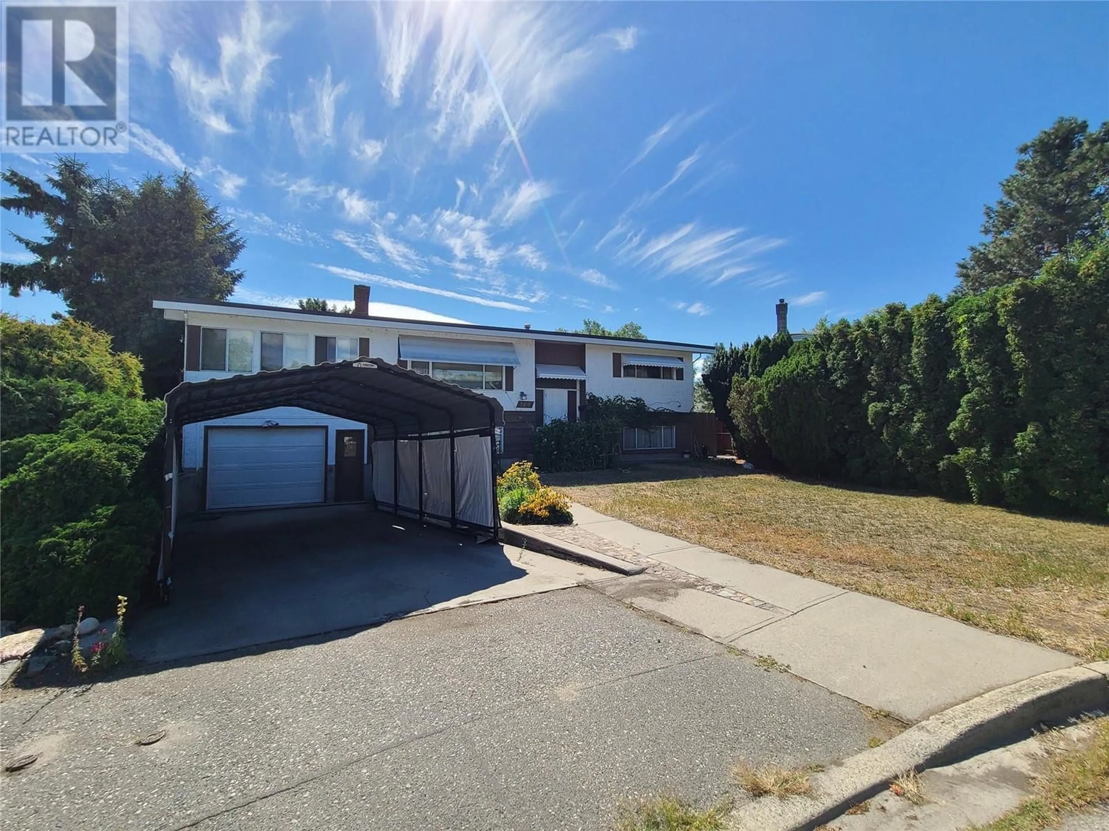 A pic from outside/outdoor area/front of a property/back of a property/a pic from drone, street for 766 Coopland Crescent, Kelowna British Columbia V1Y2V1