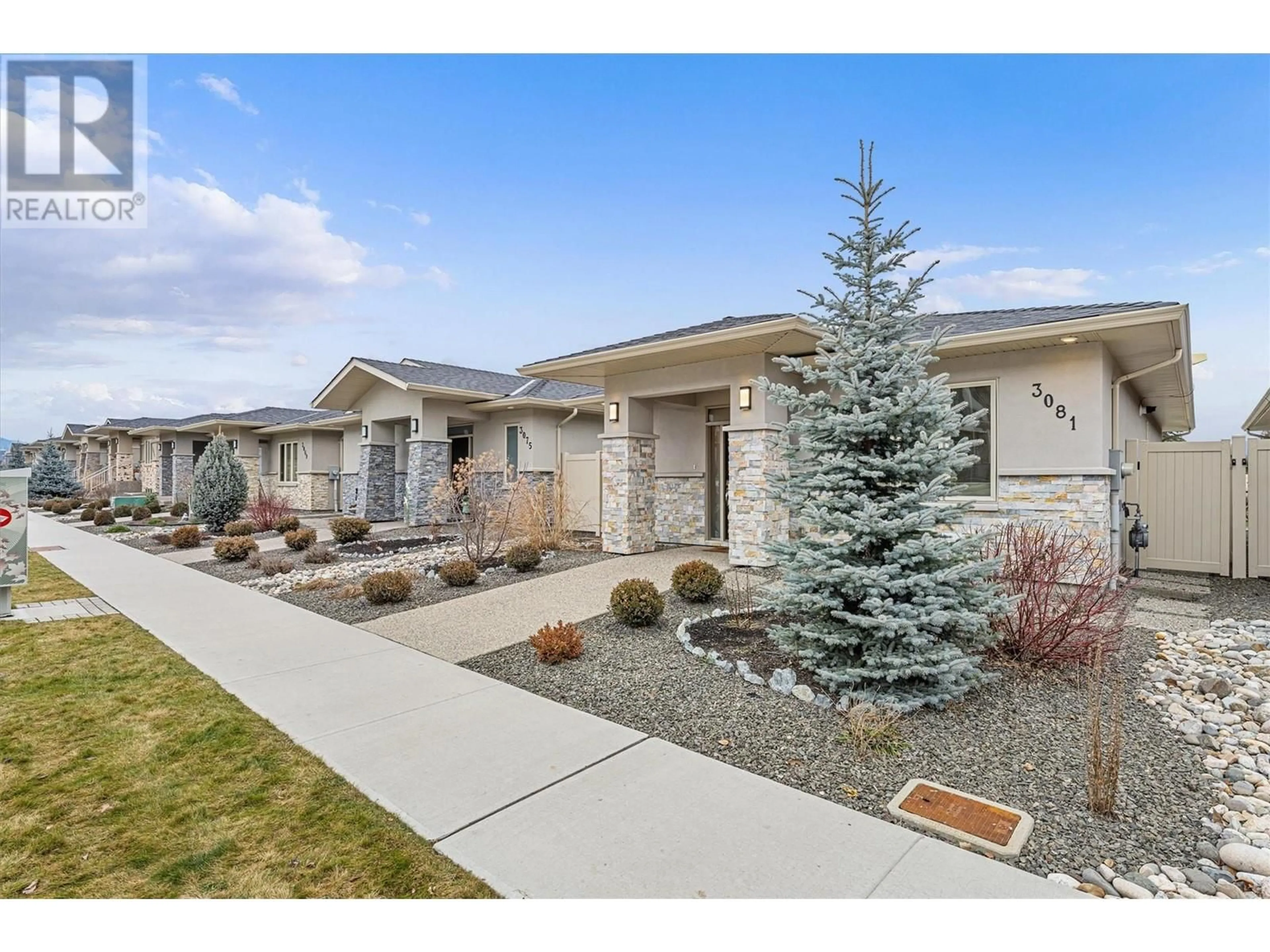 Home with brick exterior material, street for 3081 BURTCH ROAD, Kelowna British Columbia V1W5M9
