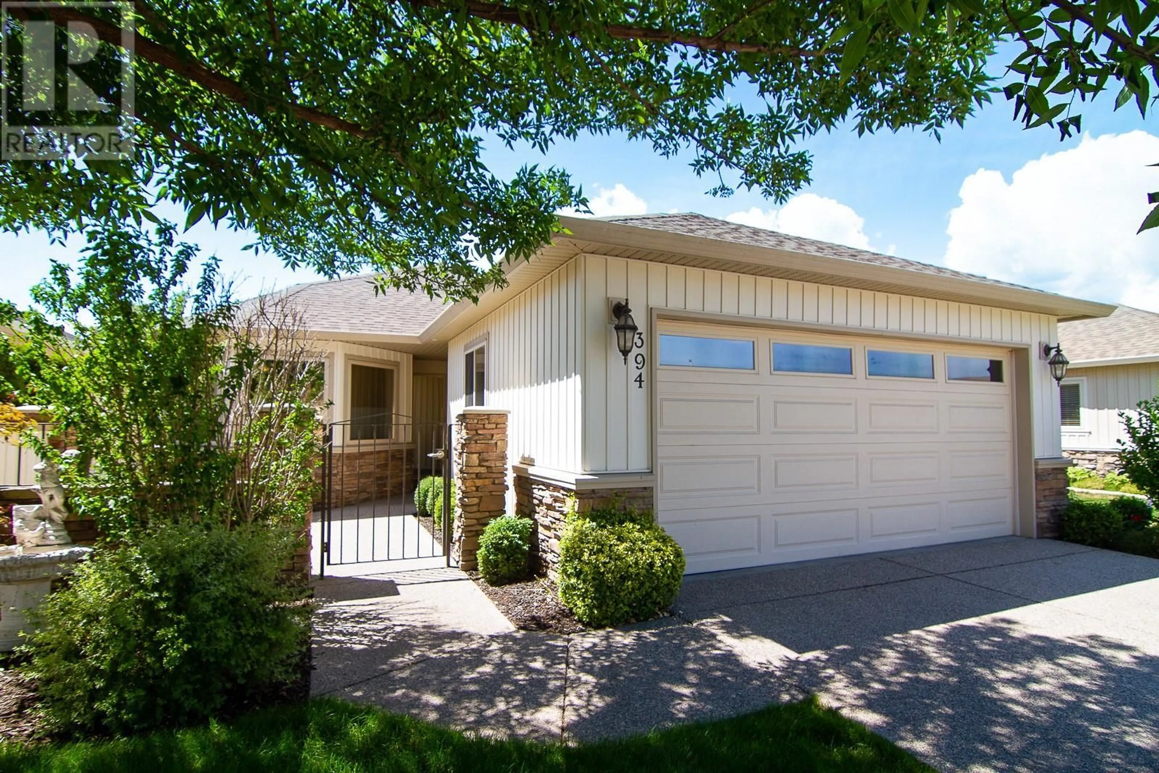 Home with vinyl exterior material, street for 2365 Stillingfleet Road Unit# 394, Kelowna British Columbia V1W4X5