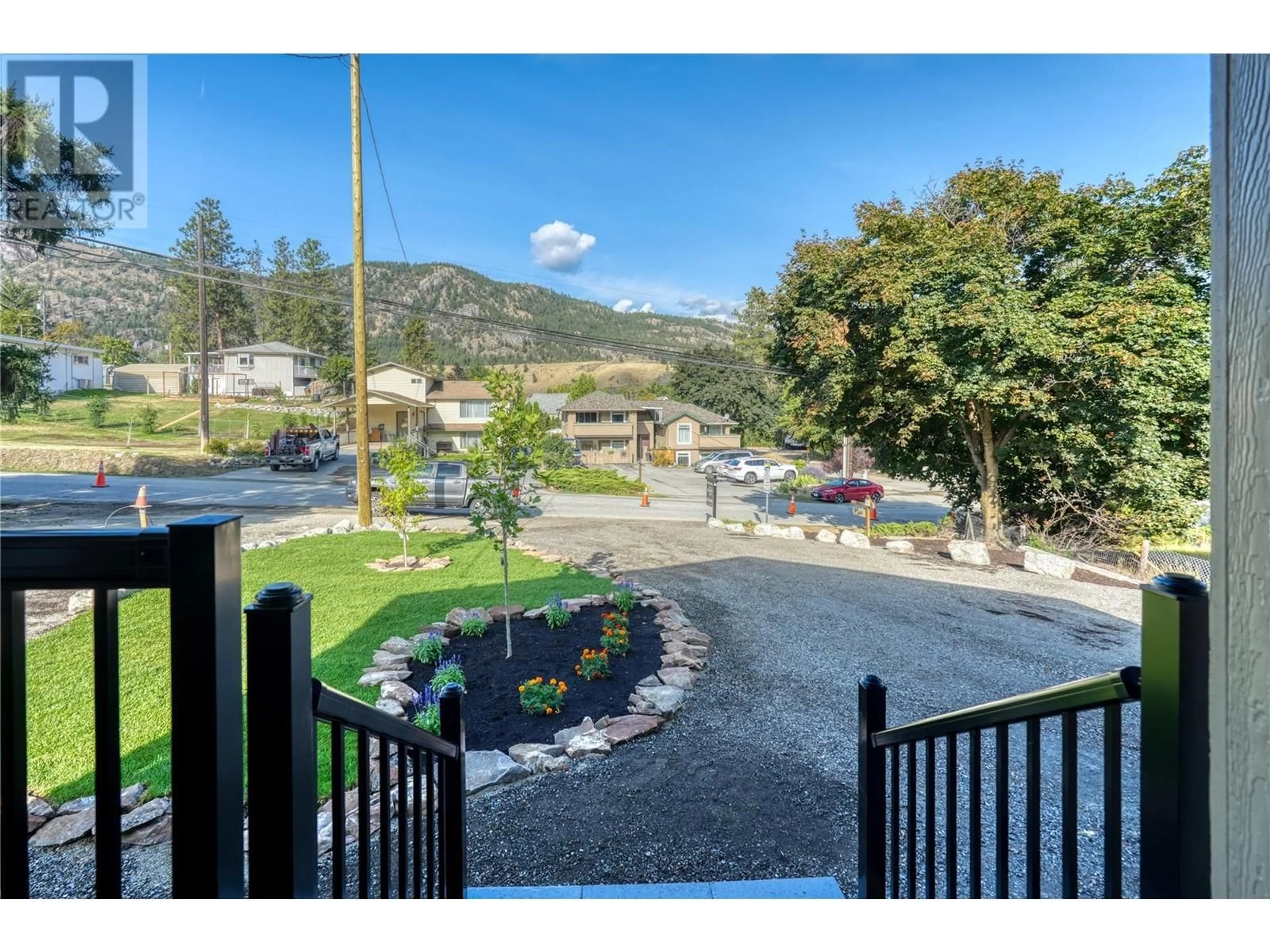 A pic from outside/outdoor area/front of a property/back of a property/a pic from drone, mountain view for 1149 Maple Street, Okanagan Falls British Columbia V0H1R2