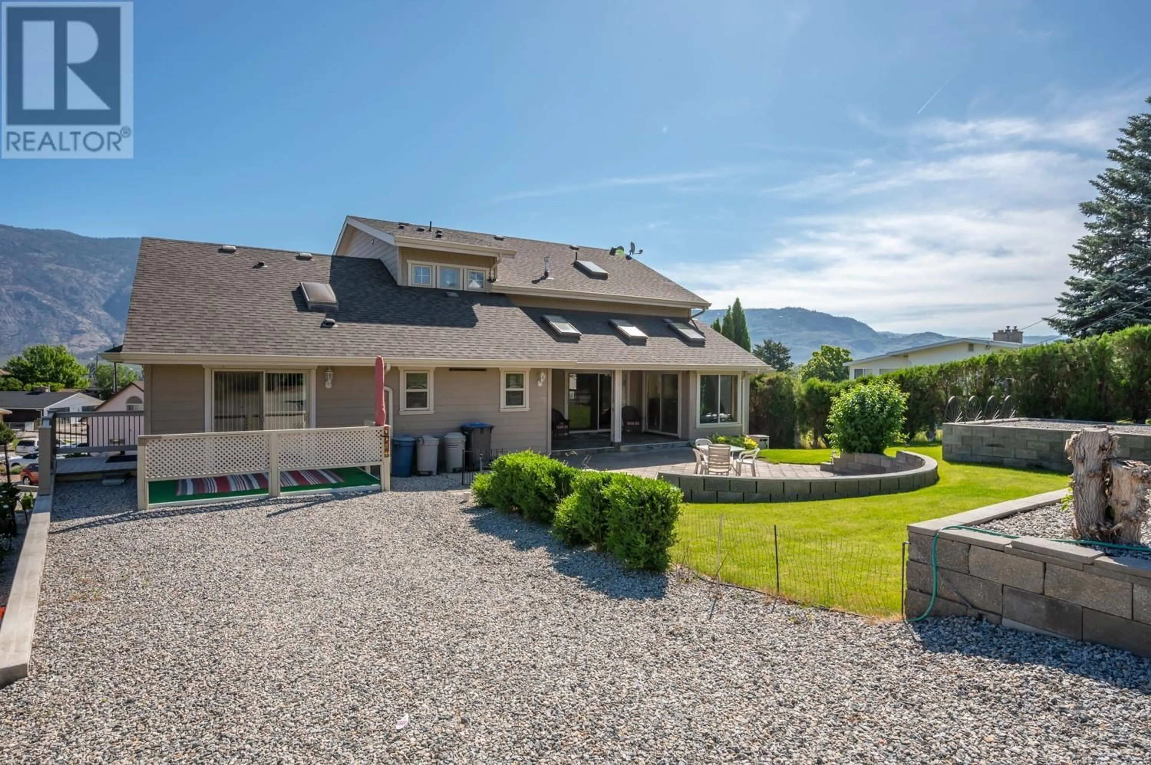 A pic from outside/outdoor area/front of a property/back of a property/a pic from drone, mountain view for 44 CACTUS CRESCENT, Osoyoos British Columbia V0H1V1