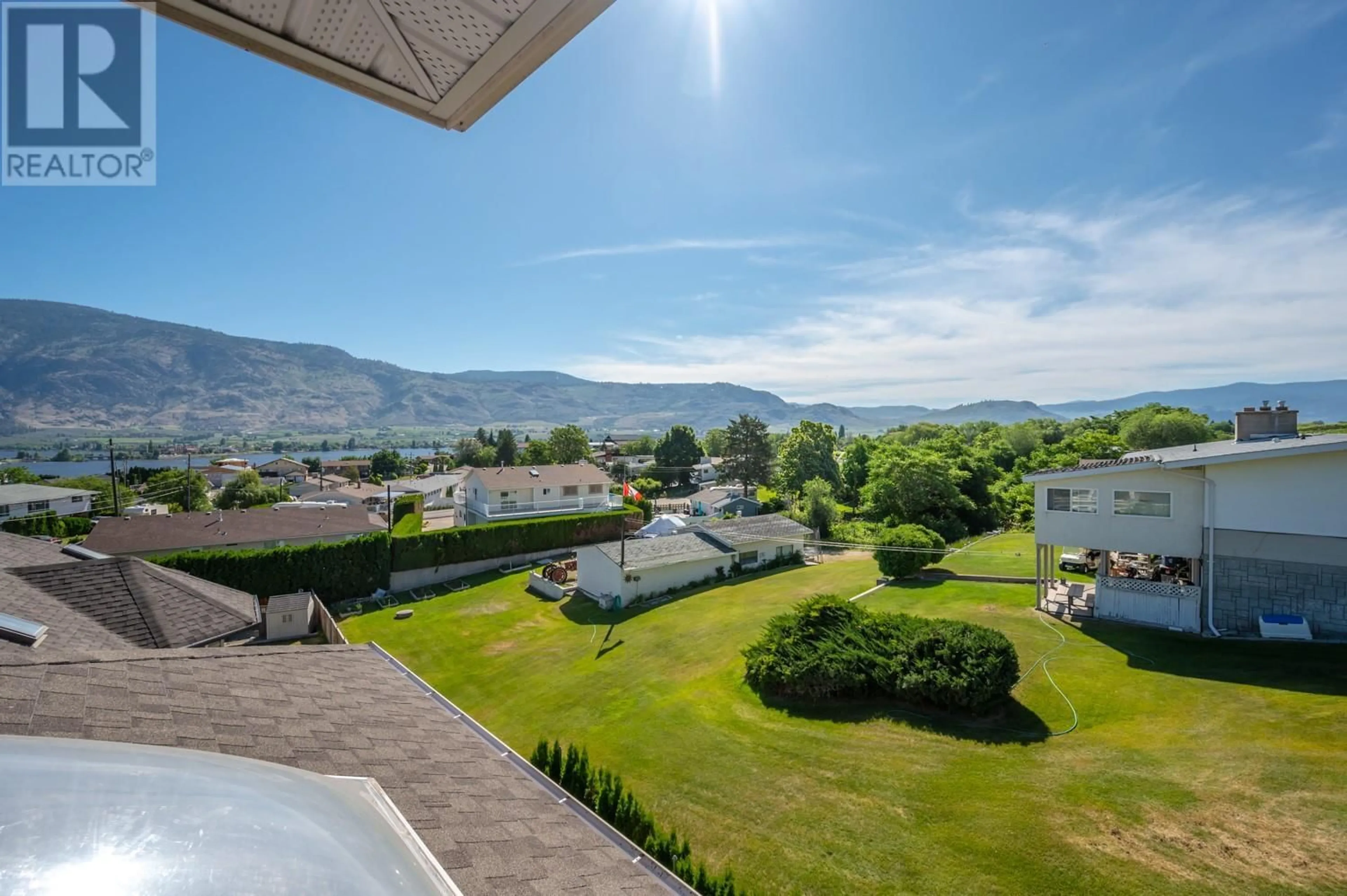 A pic from outside/outdoor area/front of a property/back of a property/a pic from drone, mountain view for 44 CACTUS Crescent, Osoyoos British Columbia V0H1V1