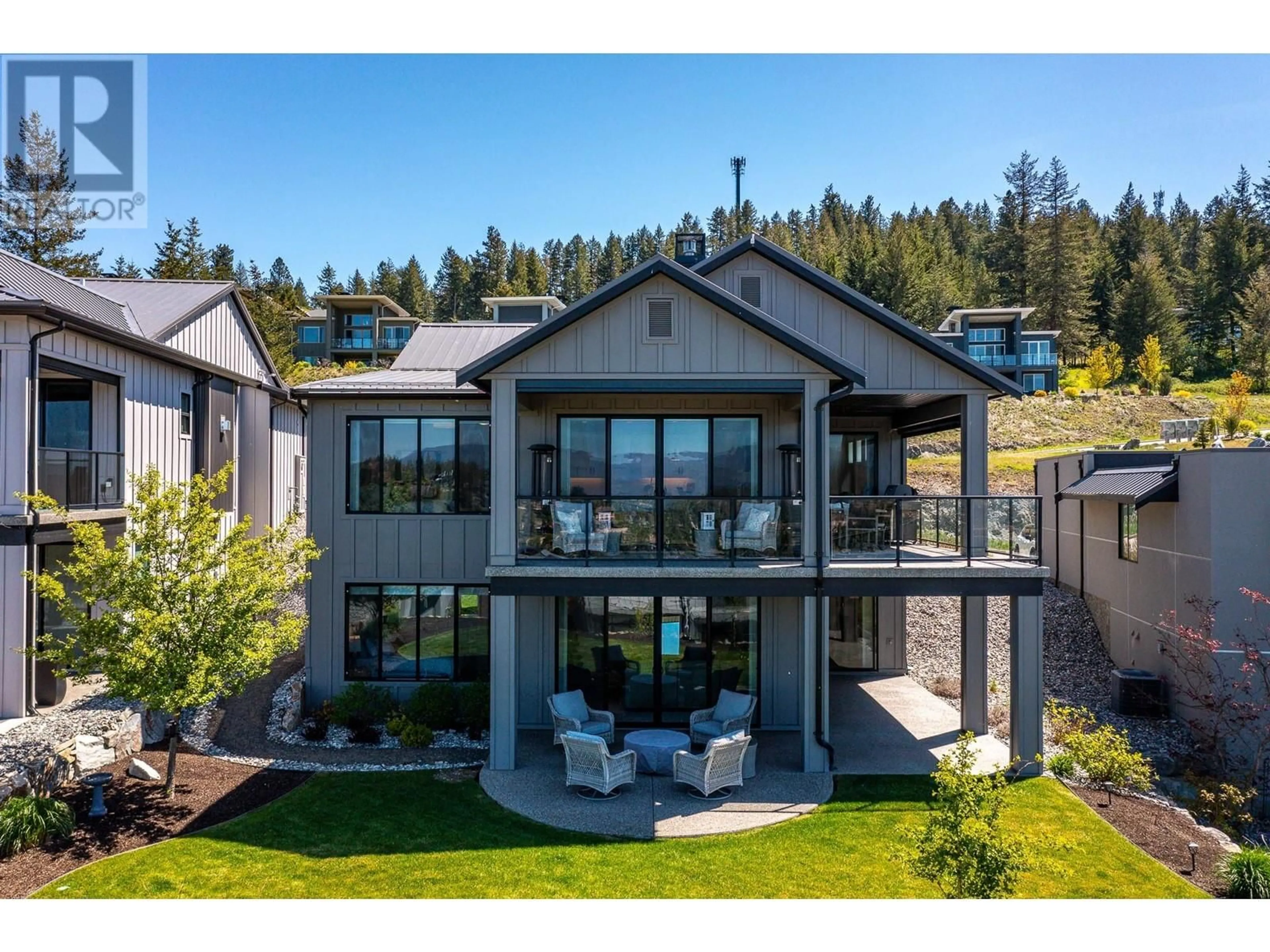 A pic from outside/outdoor area/front of a property/back of a property/a pic from drone, water/lake/river/ocean view for 219 Grange Drive, Vernon British Columbia V1H2M1