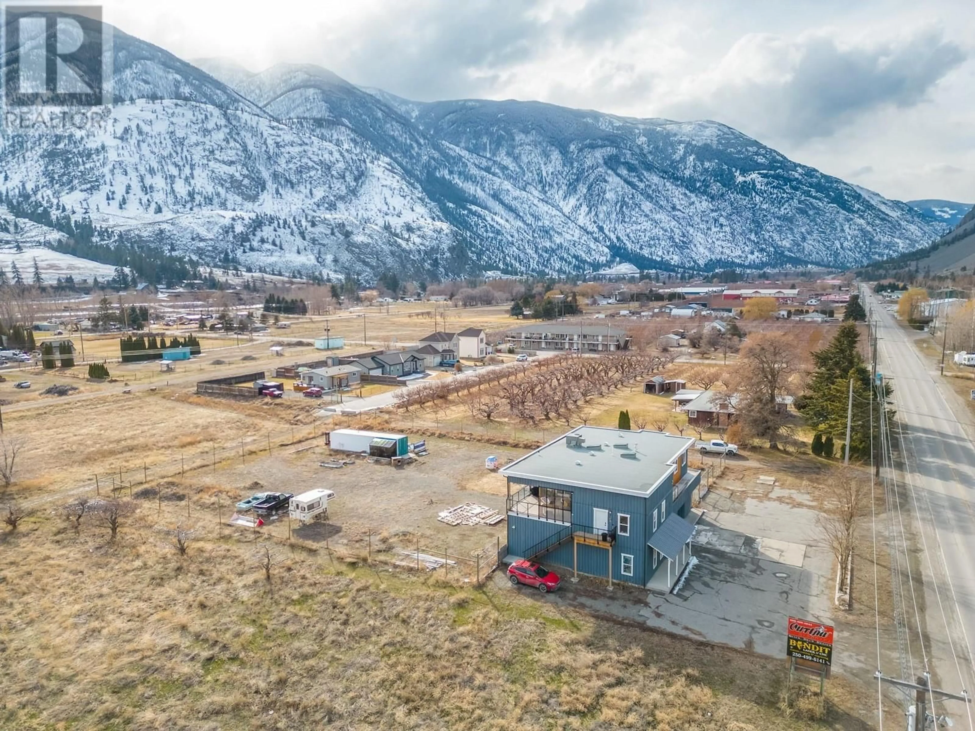 A pic from outside/outdoor area/front of a property/back of a property/a pic from drone, mountain view for 101 7th Avenue, Keremeos British Columbia V0X1N3