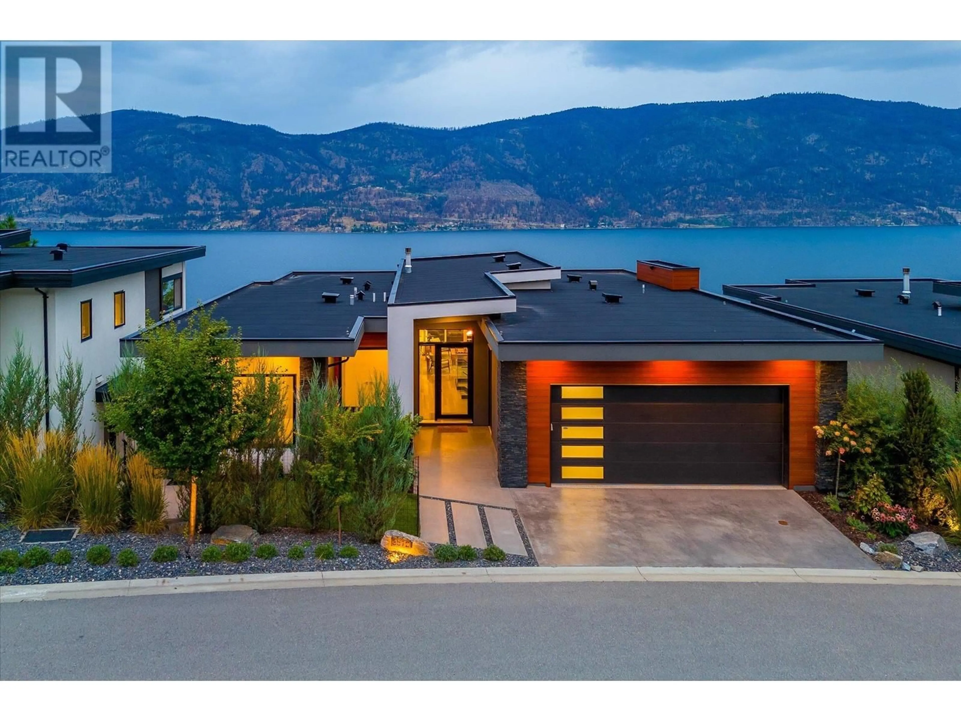 Home with brick exterior material, mountain view for 3572 Wild Rose Road, Kelowna British Columbia V1V3G1