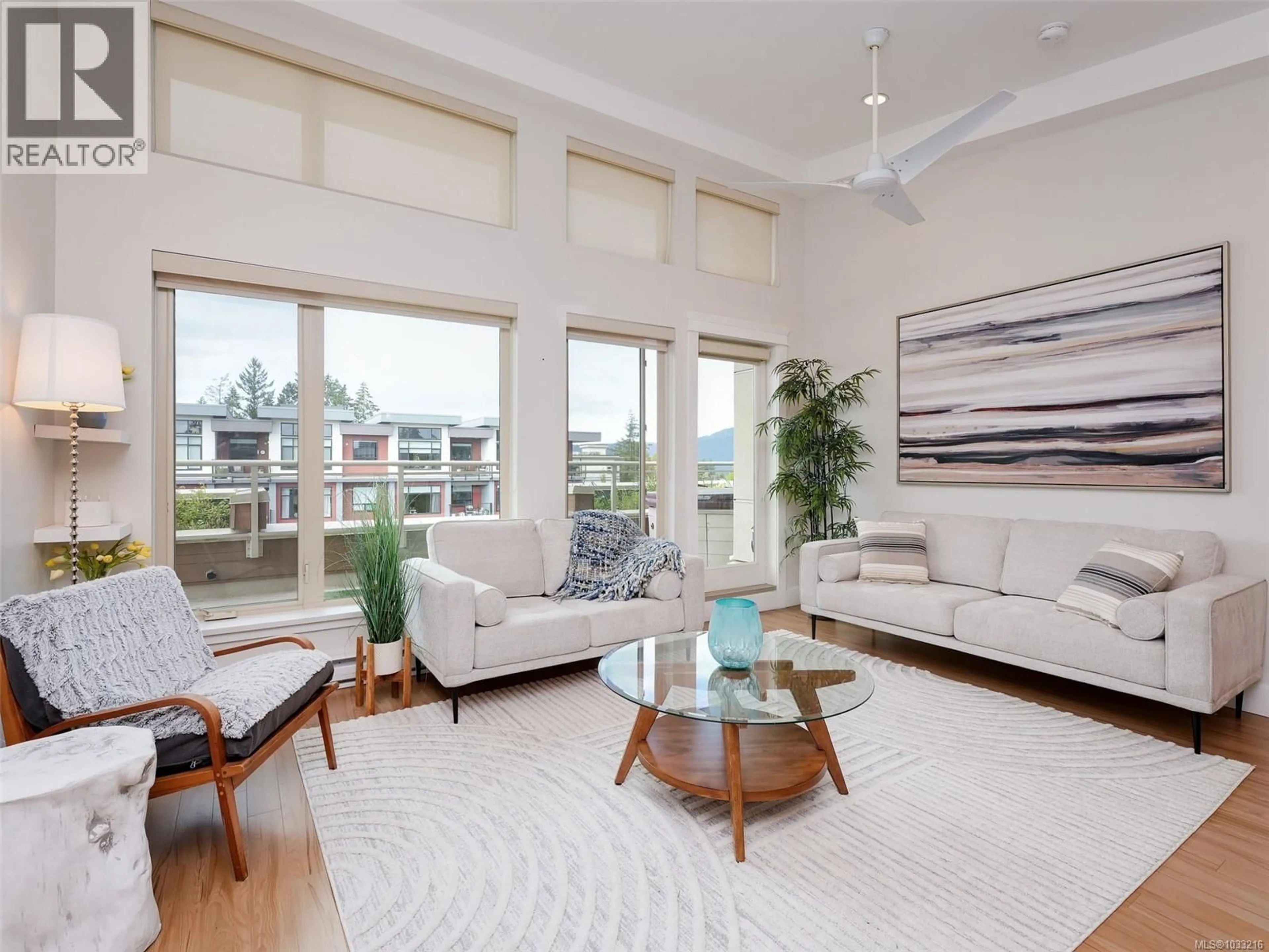 Living room with furniture, unknown for 403 - 7161 WEST SAANICH ROAD, Central Saanich British Columbia V8M1P7