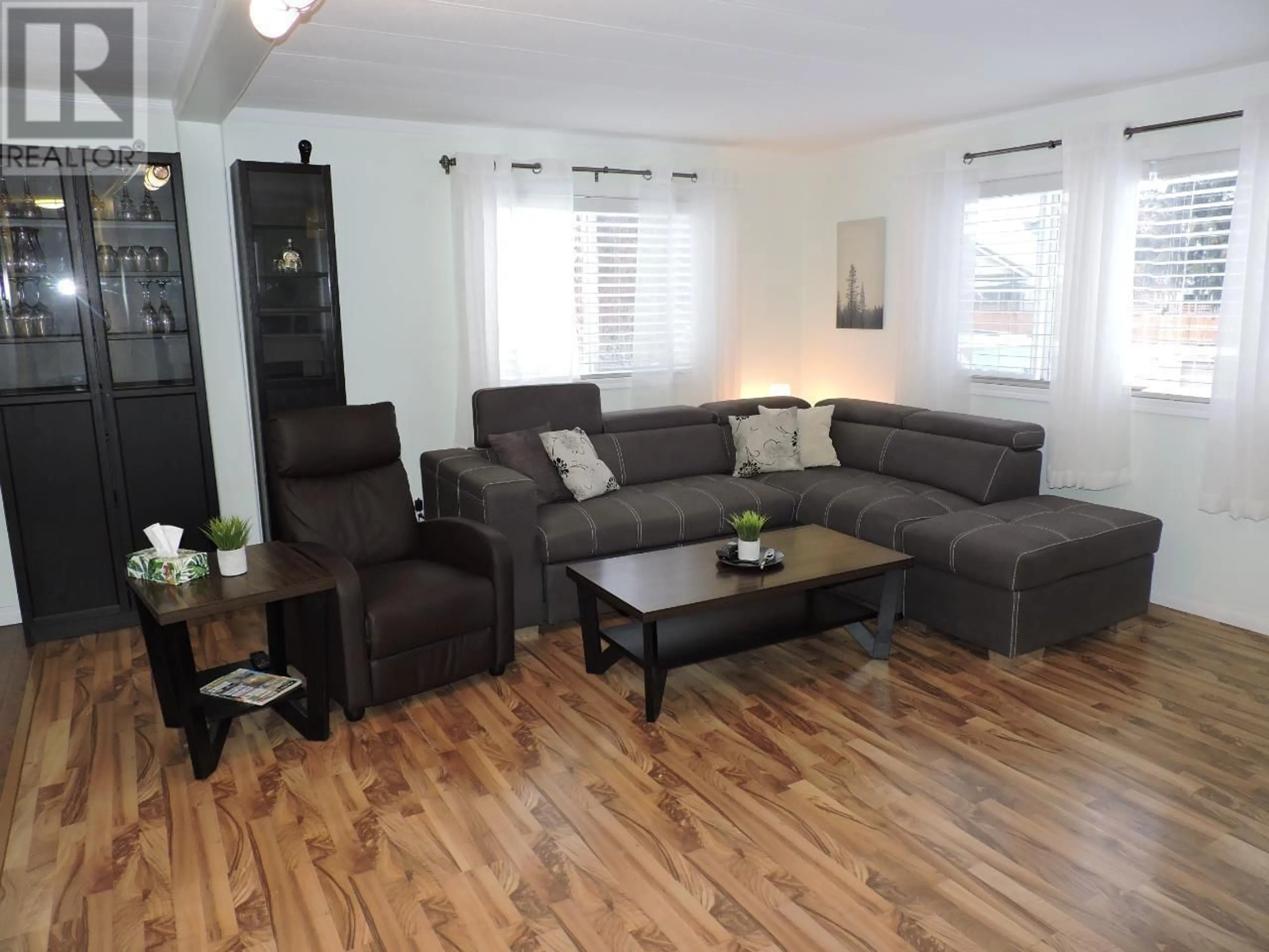 Living room with furniture, wood/laminate floor for 89 - 2025 KOOTENAY STREET NORTH, Cranbrook British Columbia V1C3N7