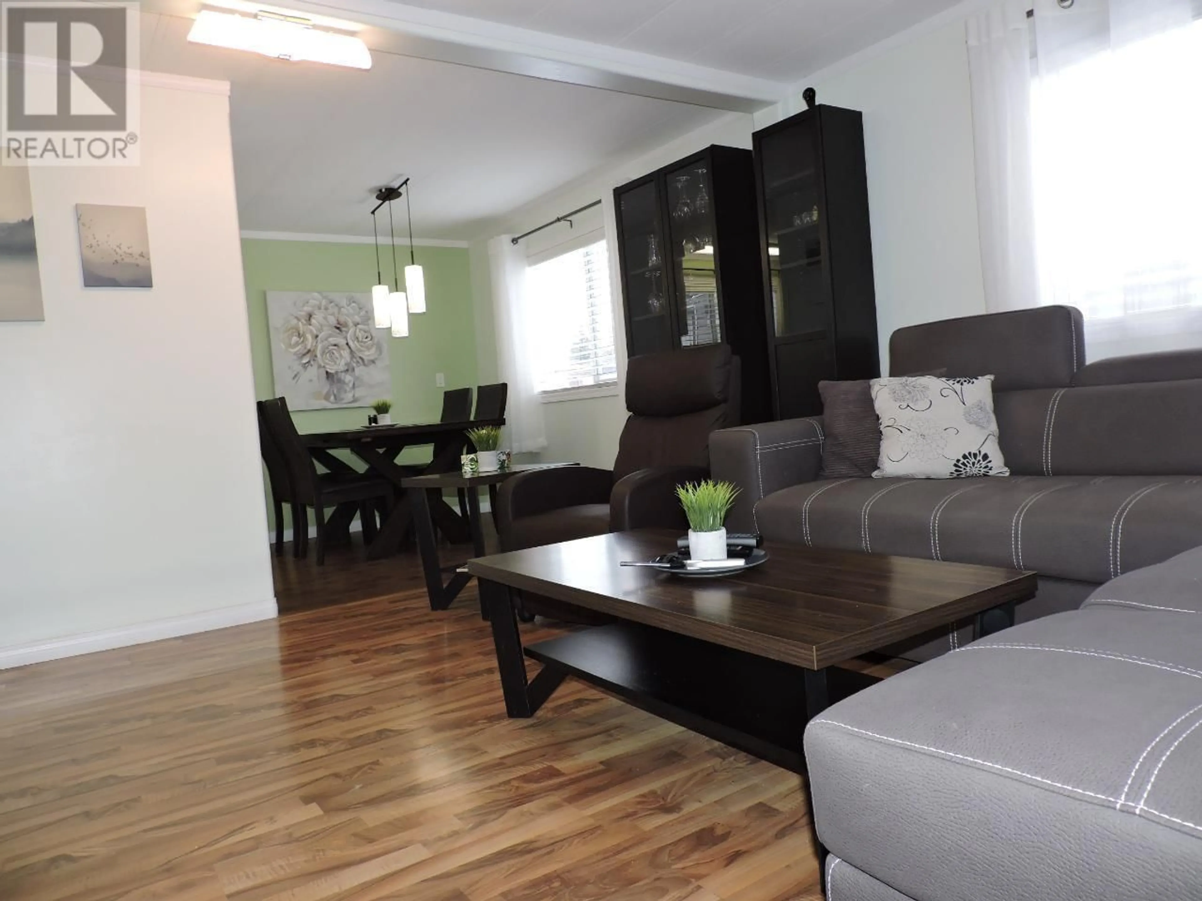Living room with furniture, wood/laminate floor for 89 - 2025 KOOTENAY STREET NORTH, Cranbrook British Columbia V1C3N7