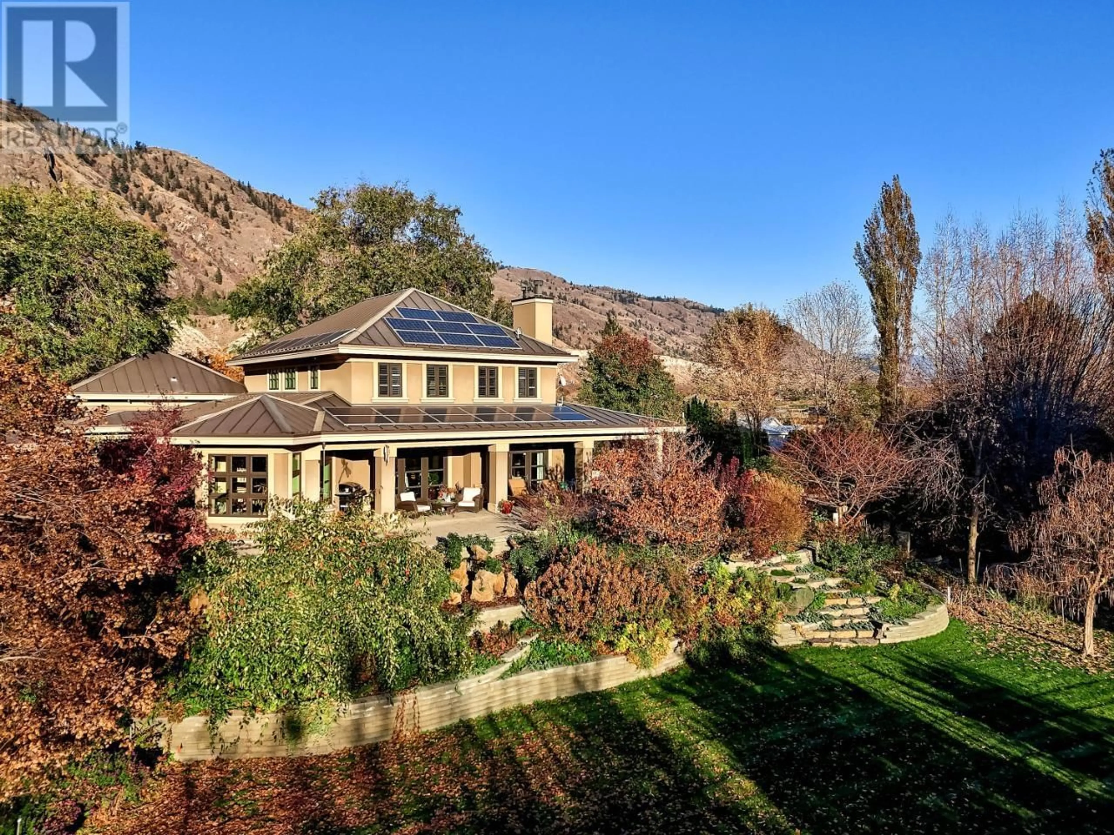 A pic from outside/outdoor area/front of a property/back of a property/a pic from drone, mountain view for 3418 SHUSWAP  E ROAD, Kamloops British Columbia V2H1T2