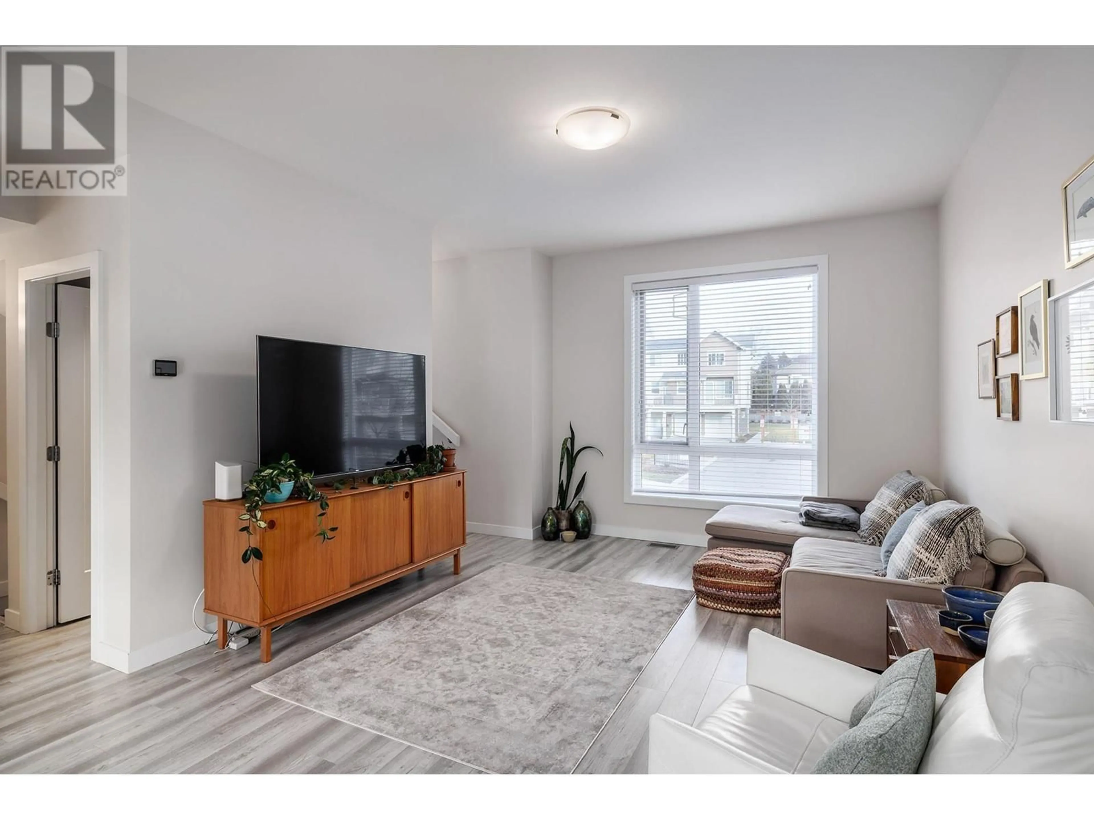 Living room with furniture, unknown for 170 Celano Crescent Unit# 2, Kelowna British Columbia V1V0B6