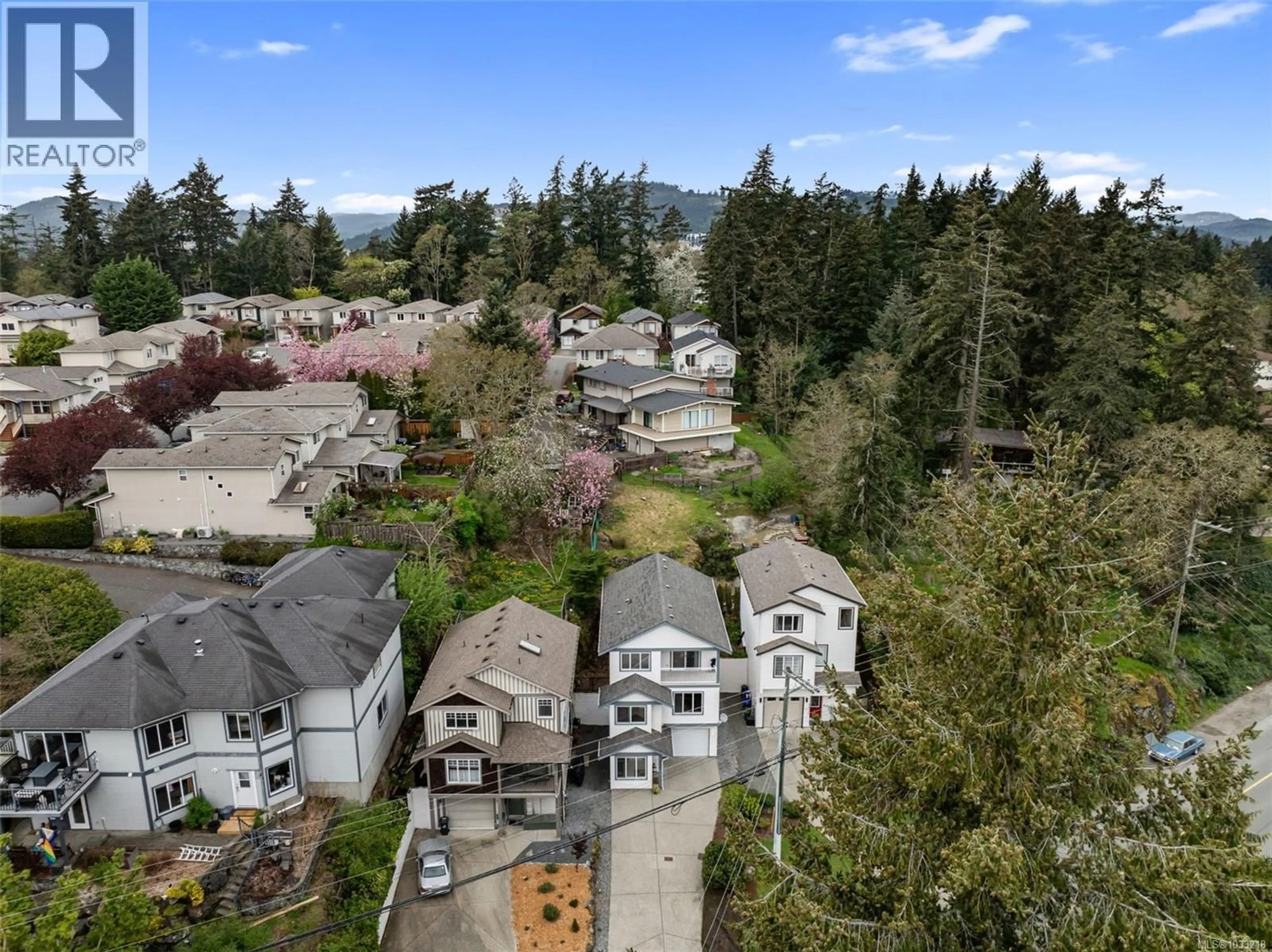 A pic from outside/outdoor area/front of a property/back of a property/a pic from drone, mountain view for 2642 SELWYN ROAD, Langford British Columbia V9B3L5