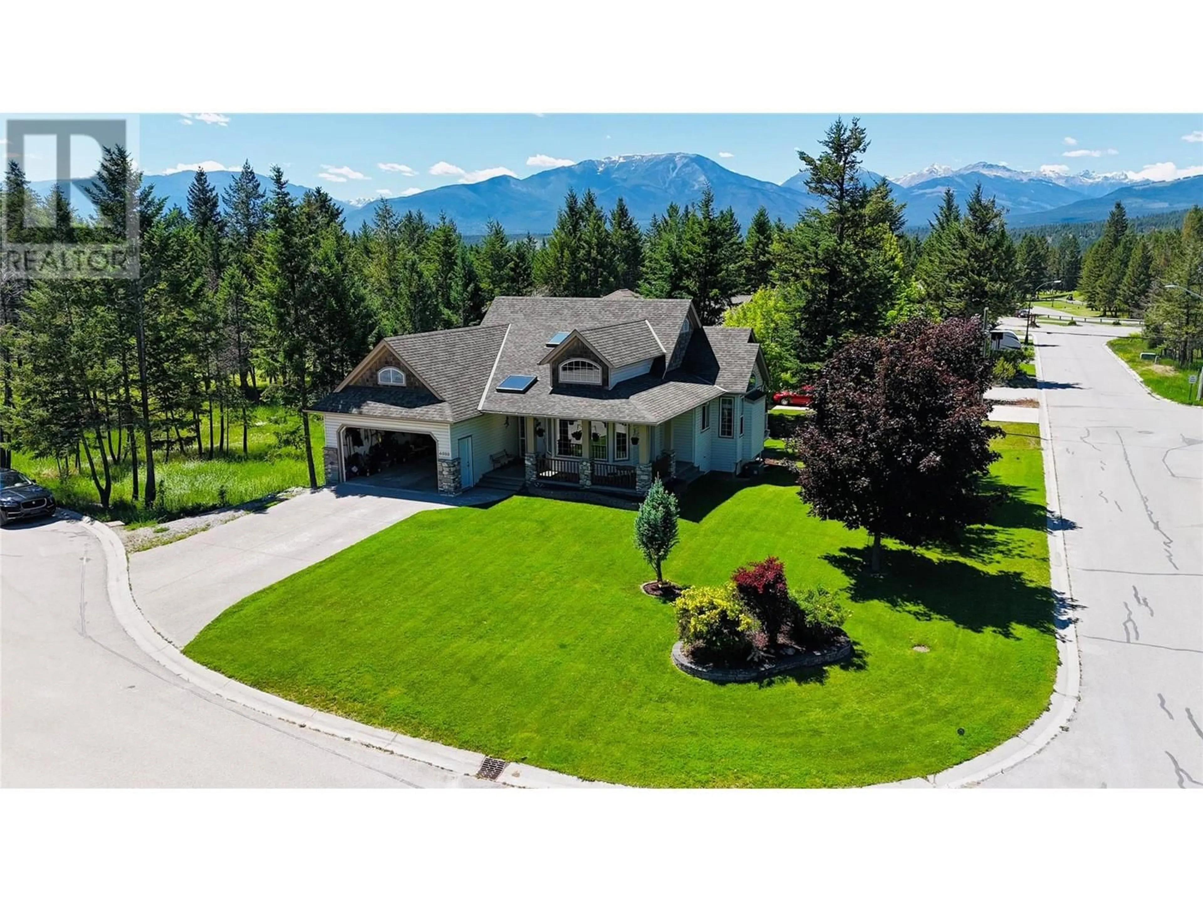 A pic from outside/outdoor area/front of a property/back of a property/a pic from drone, mountain view for 4828 FIRLAND Close, Radium Hot Springs British Columbia V0A1M0