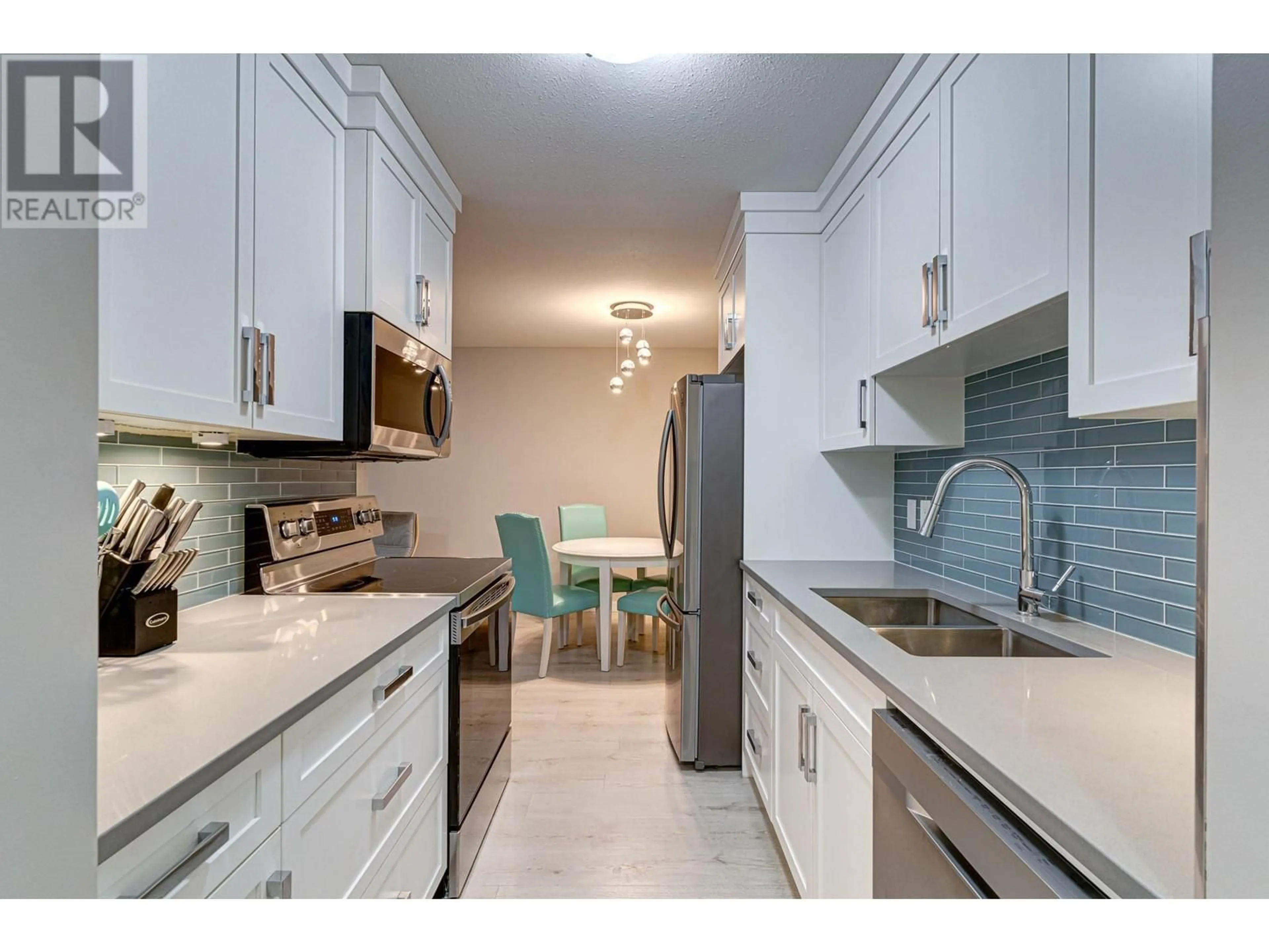 Open concept kitchen, ceramic/tile floor for 1299 PONDEROSA Drive Unit# 404A, Sparwood British Columbia V0B2G2