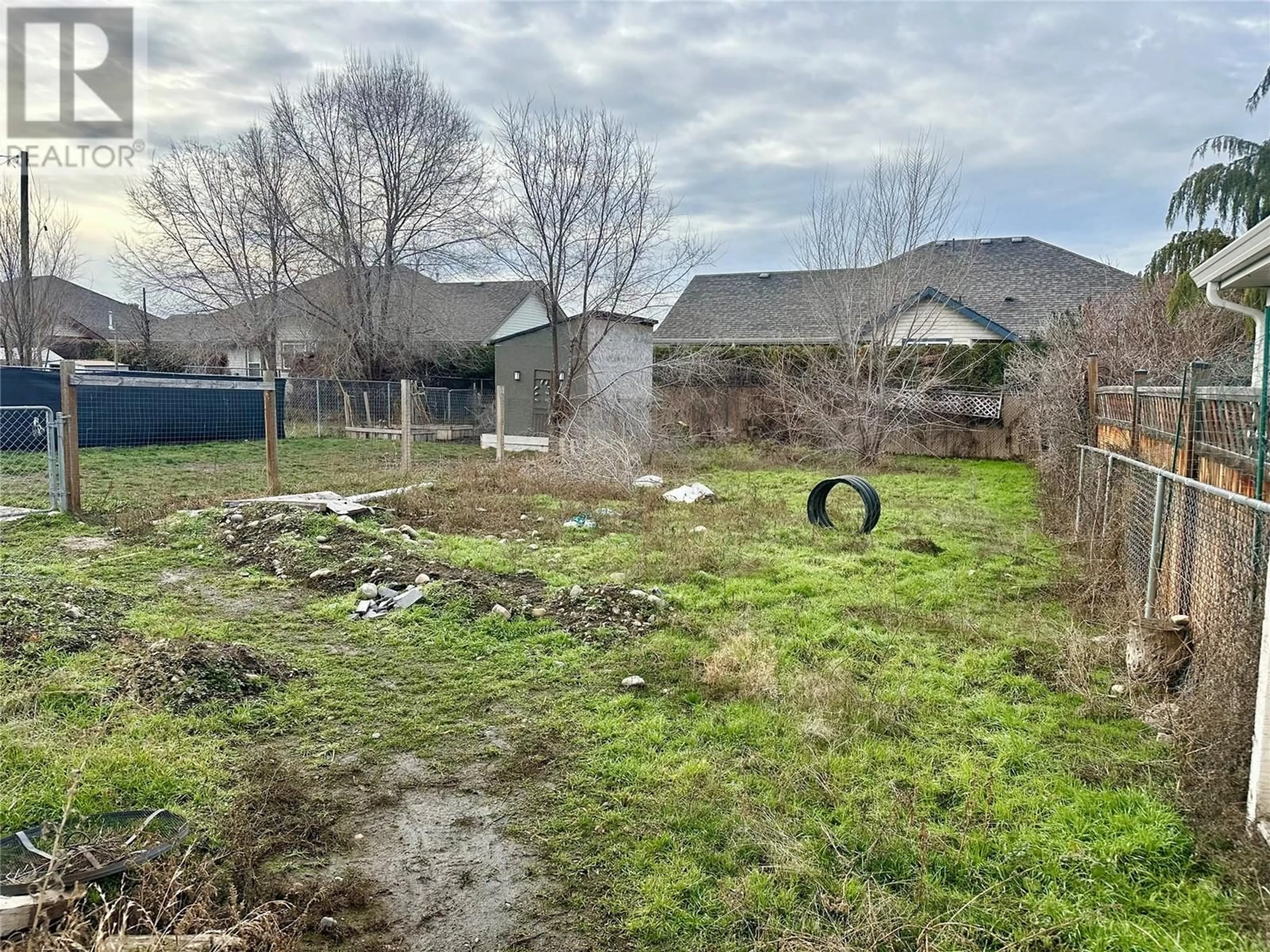 A pic from outside/outdoor area/front of a property/back of a property/a pic from drone, unknown for 528 Hein Road, Kelowna British Columbia V1X4A3