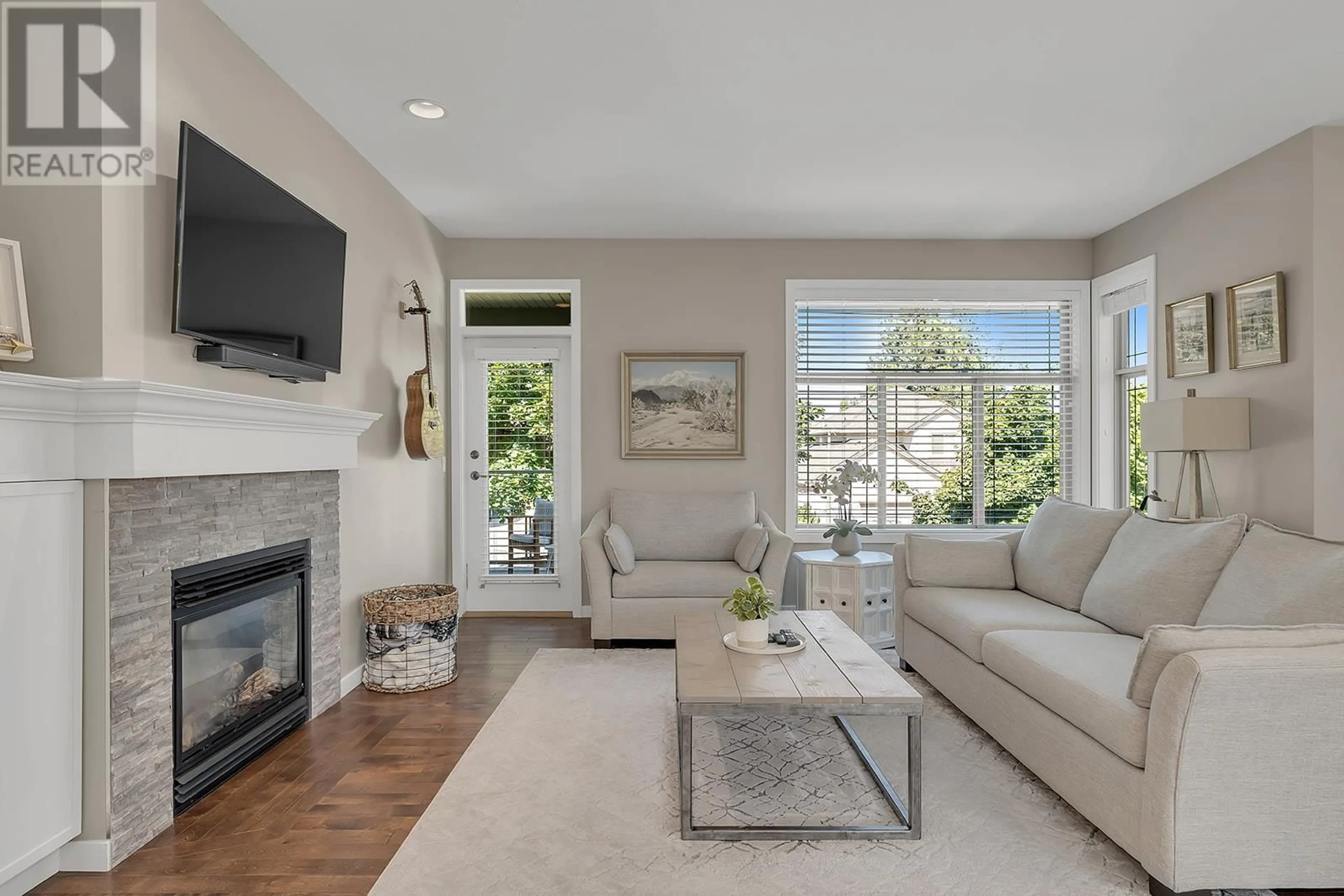 Living room with furniture, unknown for 4943 Windsong Crescent, Kelowna British Columbia V1W4Y2