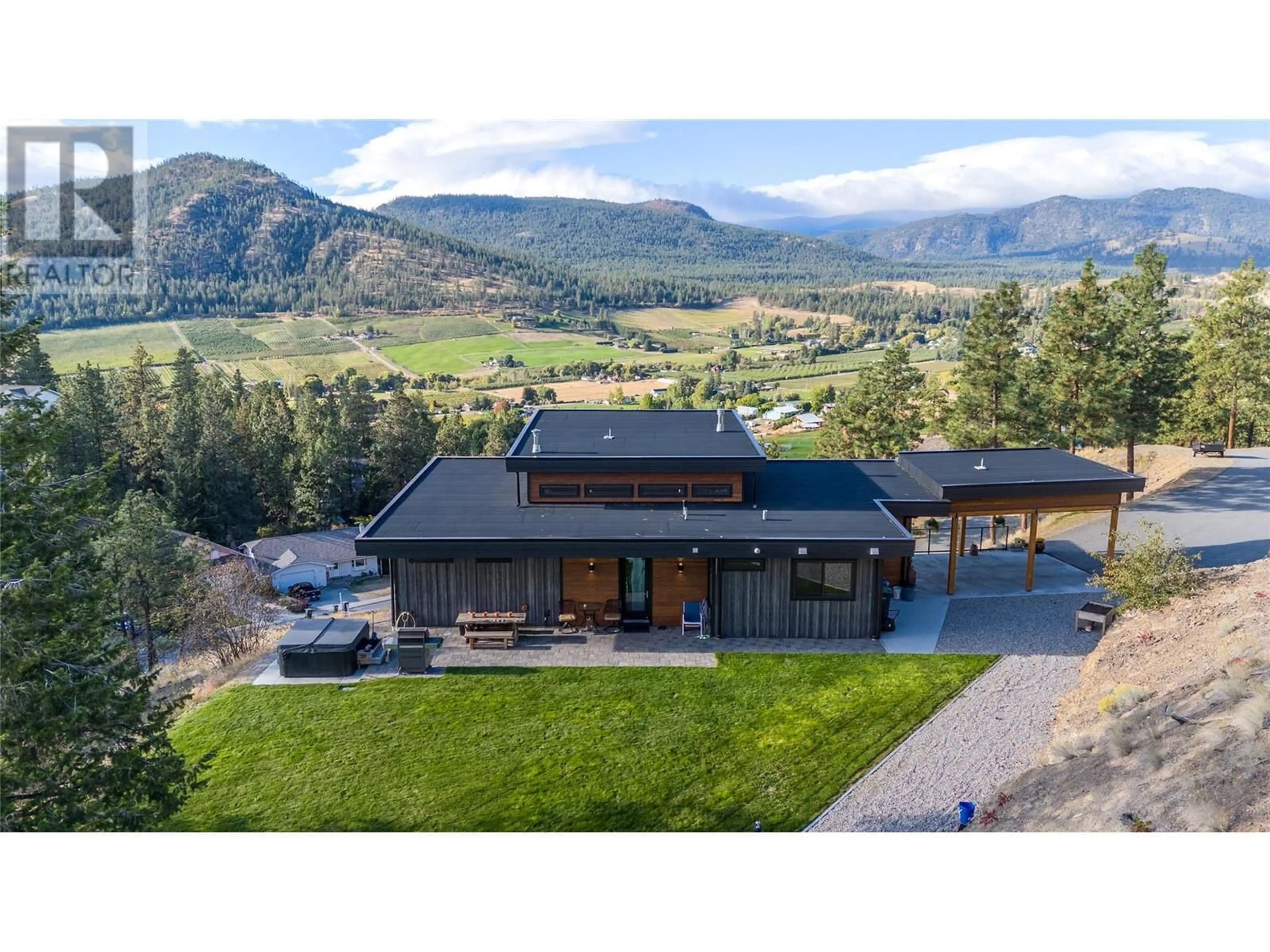 A pic from outside/outdoor area/front of a property/back of a property/a pic from drone, mountain view for 13710 Summergate Drive, Summerland British Columbia V0H1Z8