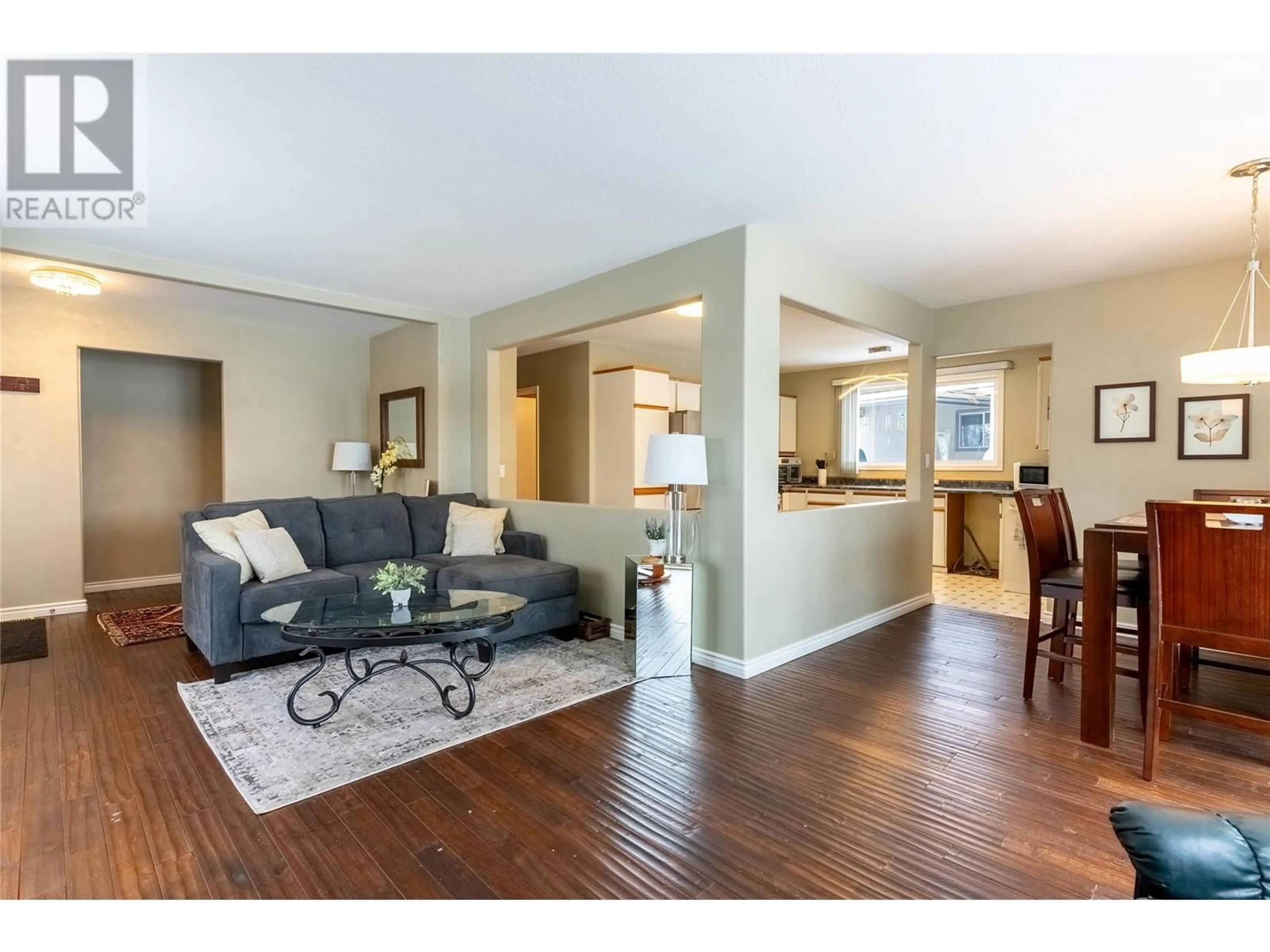 Living room with furniture, wood/laminate floor for 9 EMERALD Drive, Logan Lake British Columbia V0K1W0