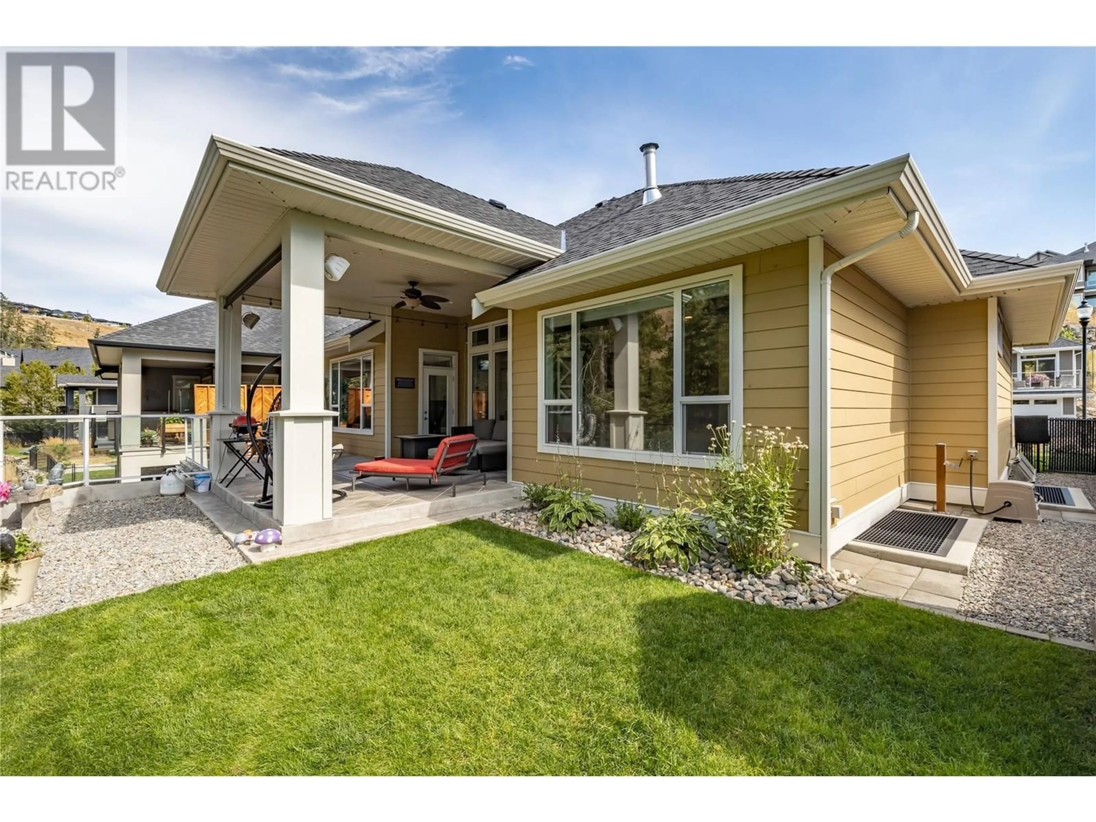 Home with vinyl exterior material, street for 224 LOST CREEK COURT, Kelowna British Columbia V1V3B7