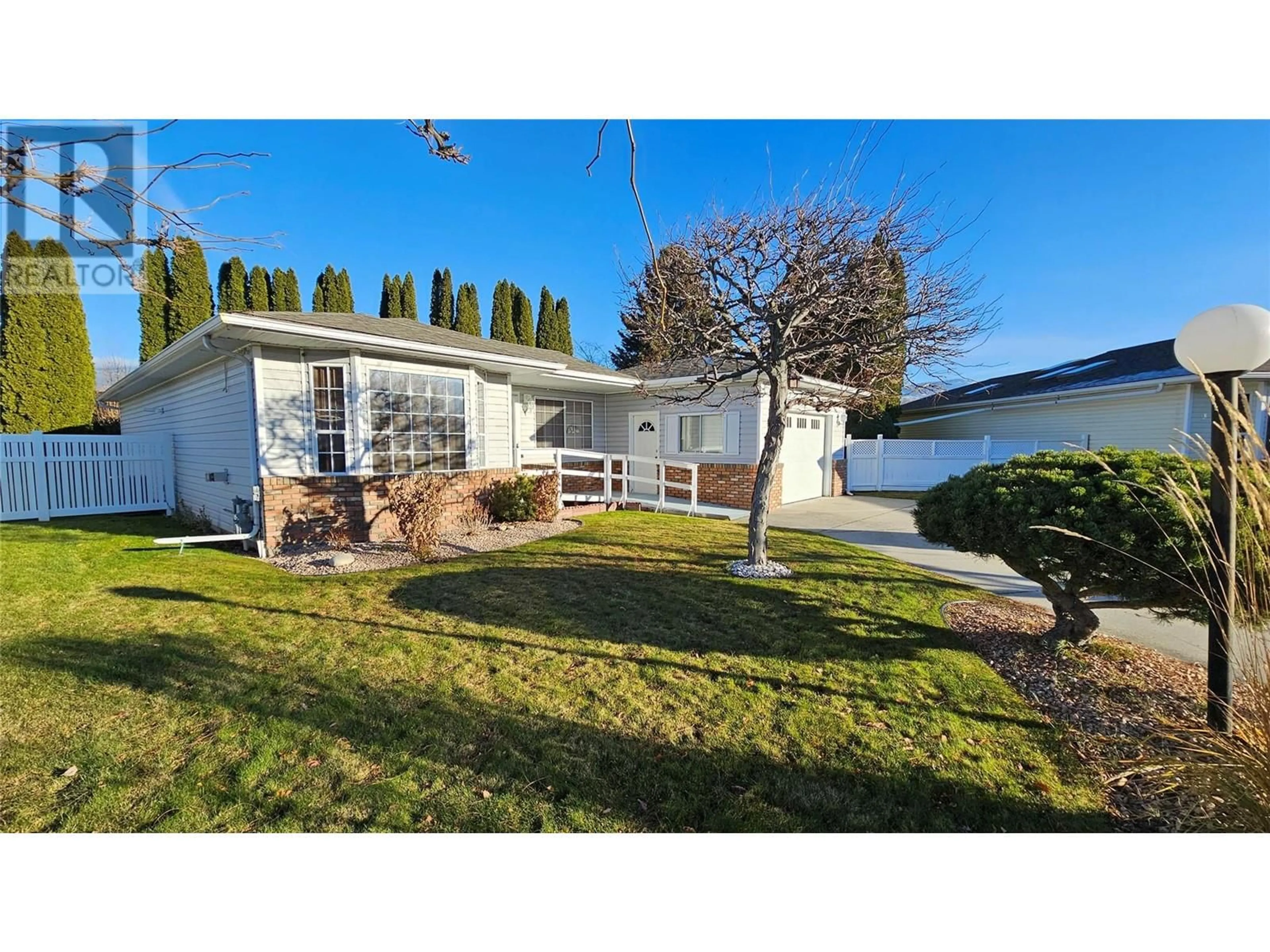 A pic from outside/outdoor area/front of a property/back of a property/a pic from drone, street for 221 SANDPIPER CRESCENT, Penticton British Columbia V2A8K6