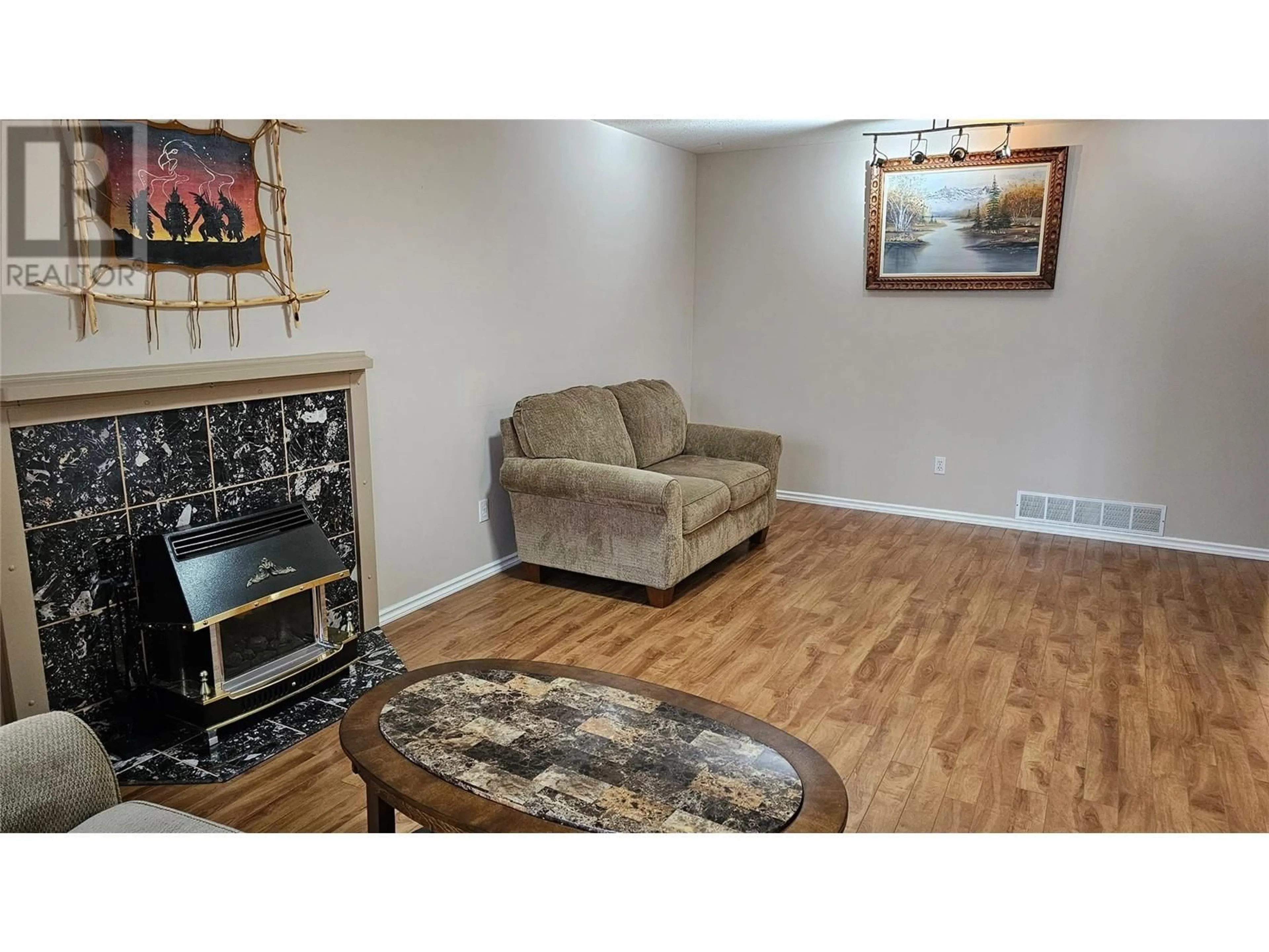 Living room with furniture, unknown for 221 SANDPIPER CRESCENT, Penticton British Columbia V2A8K6