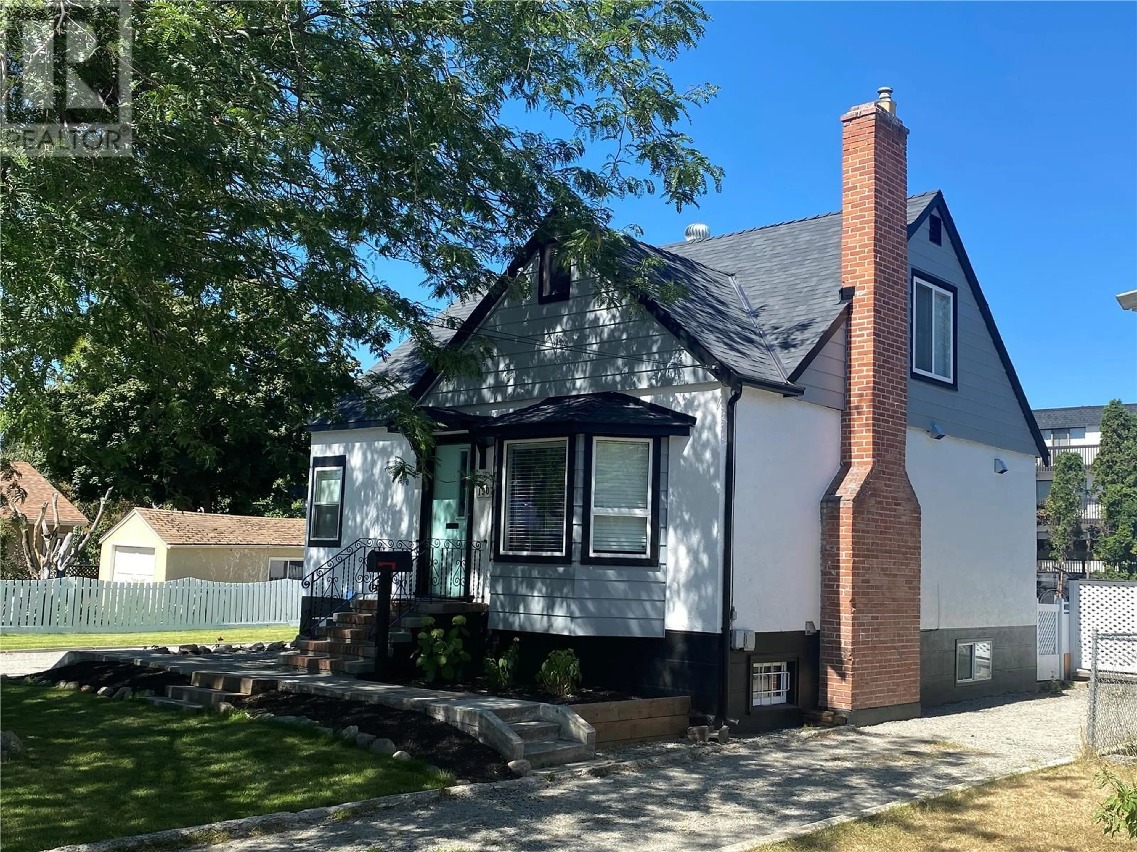 Home with brick exterior material, street for 1907 KNOX CRESCENT, Kelowna British Columbia V1Y1K9