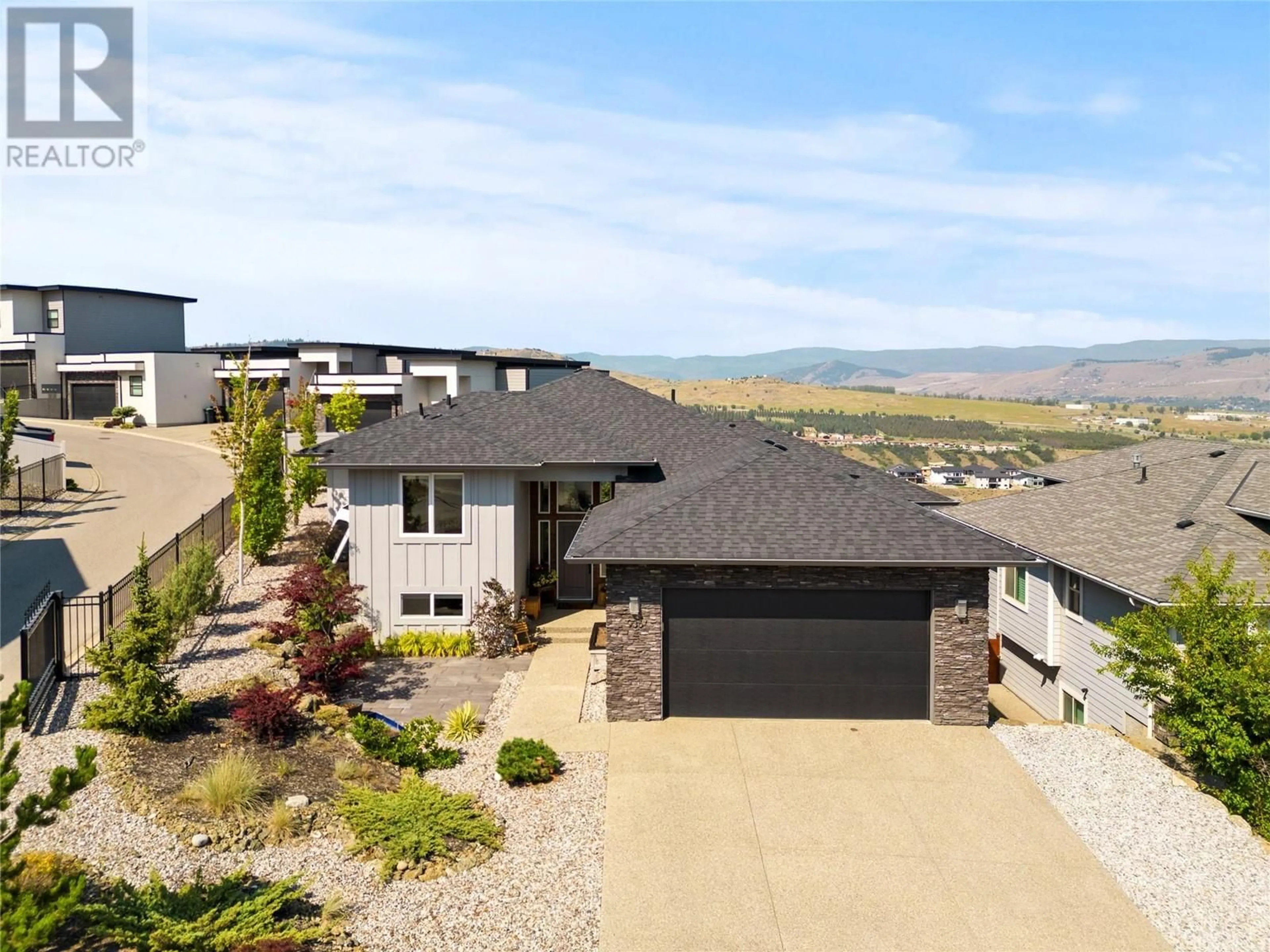 A pic from outside/outdoor area/front of a property/back of a property/a pic from drone, mountain view for 936 MT IDA DRIVE, Vernon British Columbia V1B4G2
