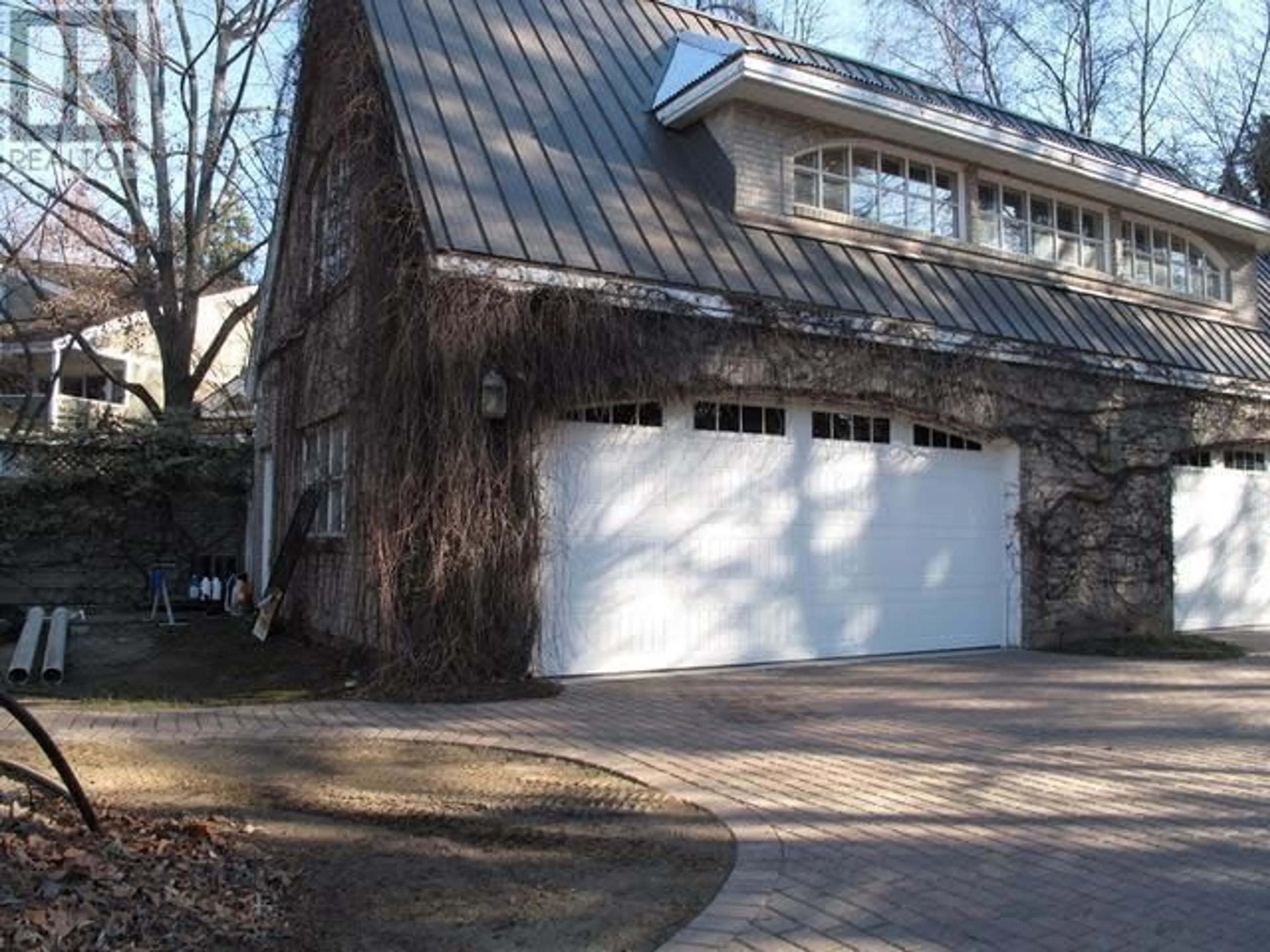 Home with brick exterior material, street for 4614 FULLER ROAD, Kelowna British Columbia V1W1Z7