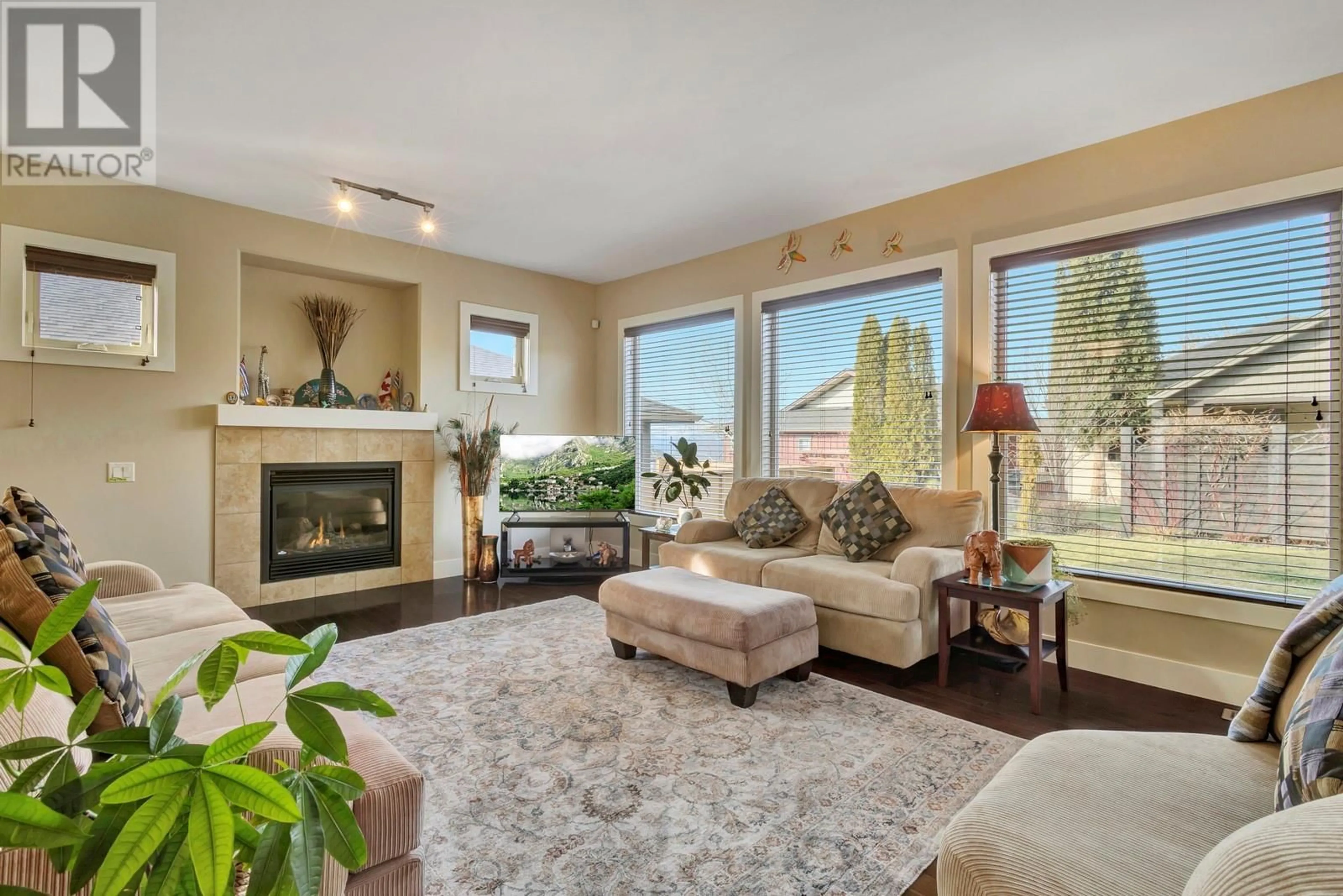 Living room with furniture, unknown for 1828 Split Rail Place, Kelowna British Columbia V1P1R1