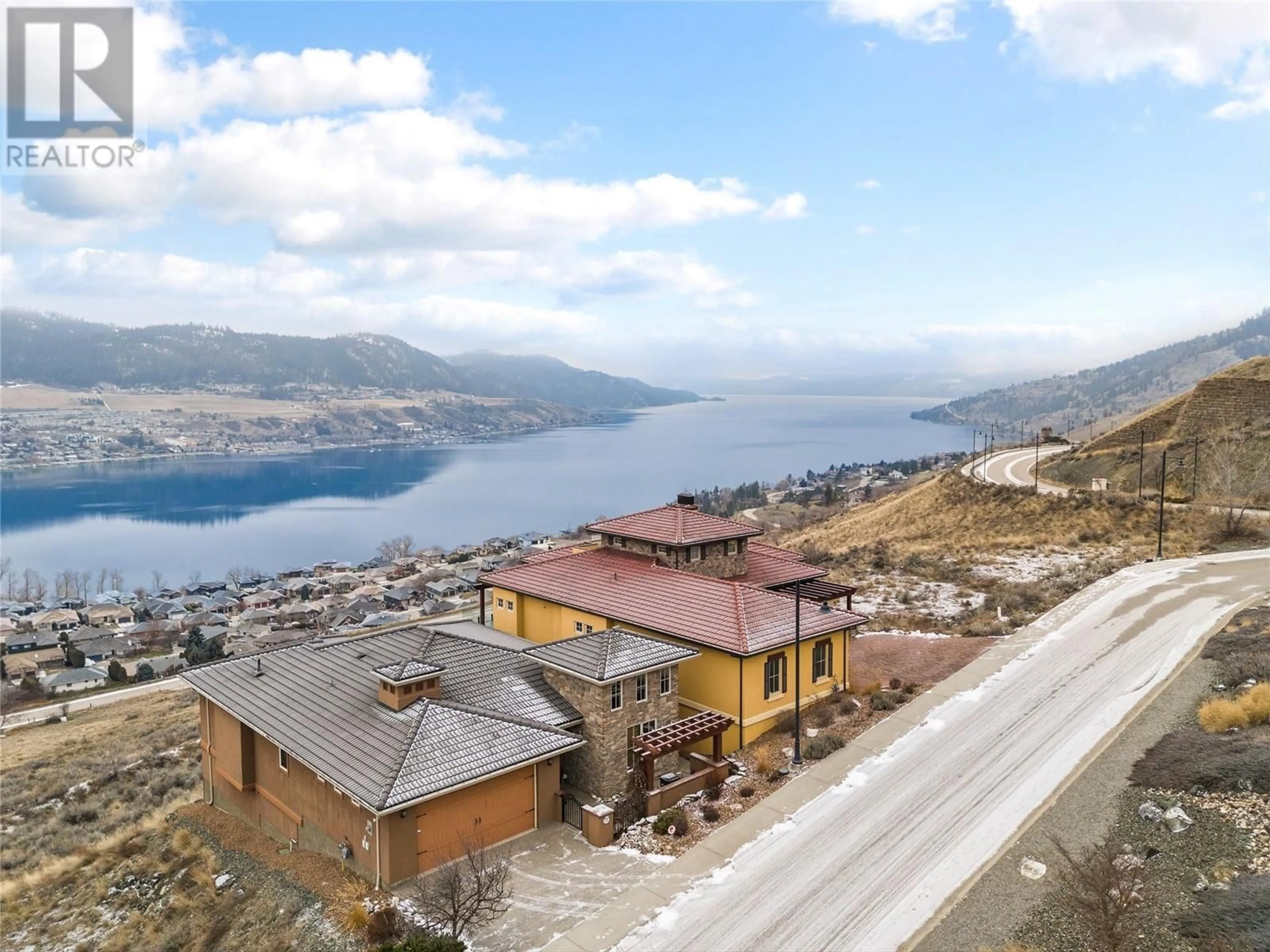 A pic from outside/outdoor area/front of a property/back of a property/a pic from drone, unknown for 108 Vineyard Way, Vernon British Columbia V1H1Z7