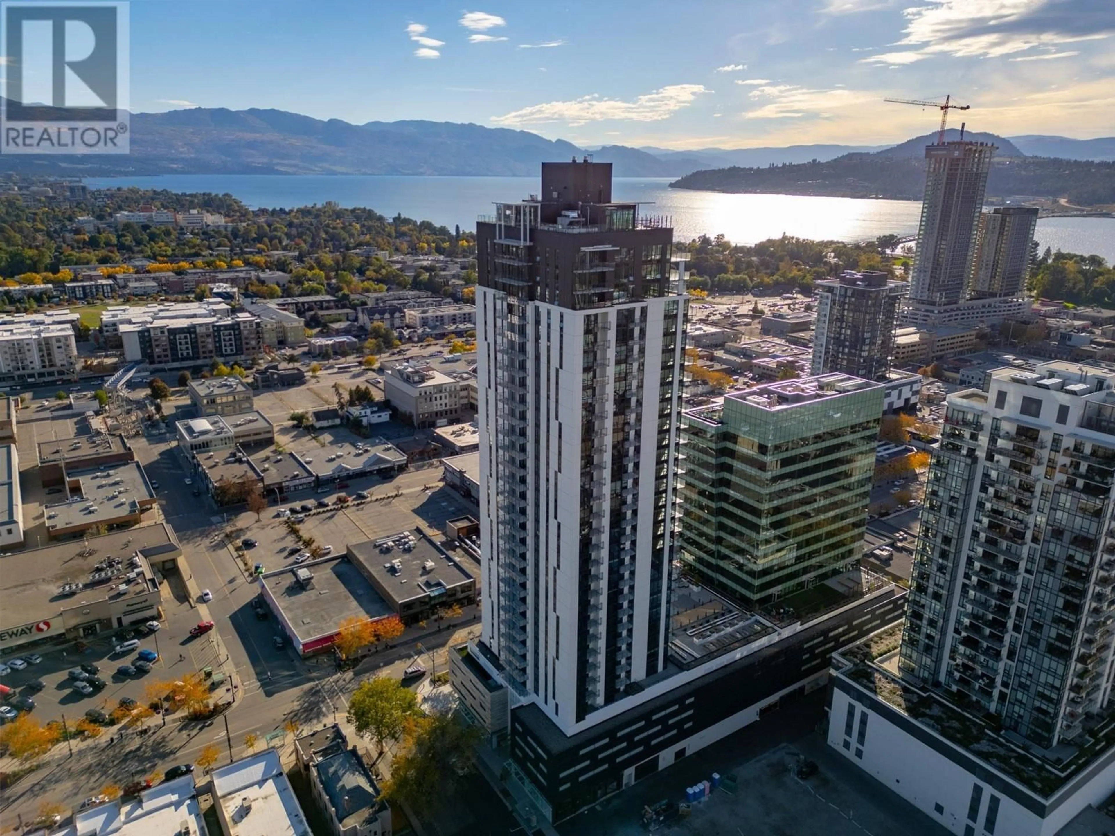 A pic from outside/outdoor area/front of a property/back of a property/a pic from drone, city buildings view from balcony for 1488 Bertram Street Unit# 1810, Kelowna British Columbia V1Y0M6