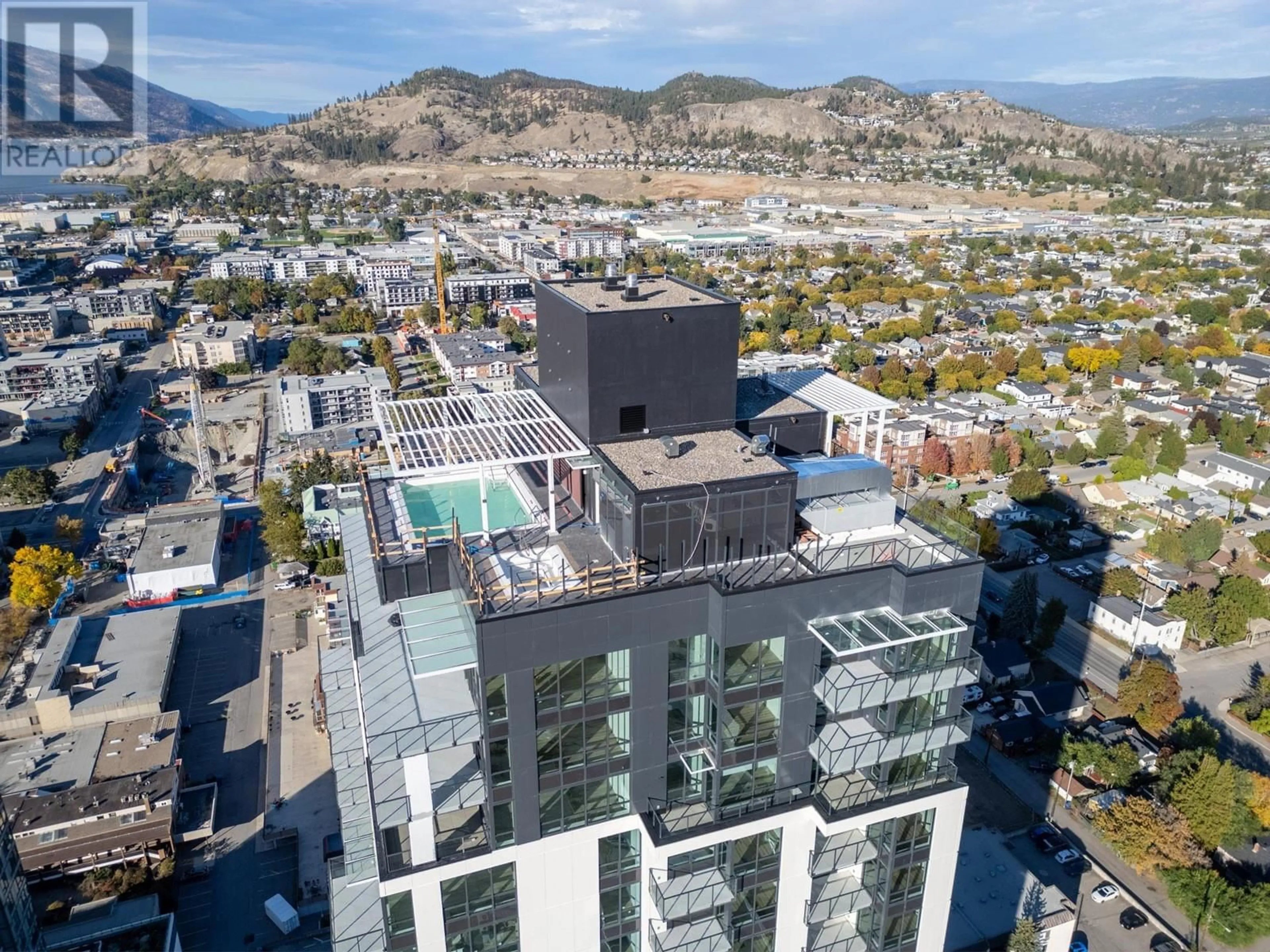 A pic from outside/outdoor area/front of a property/back of a property/a pic from drone, city buildings view from balcony for 1488 Bertram Street Unit# 1810, Kelowna British Columbia V1Y0M6